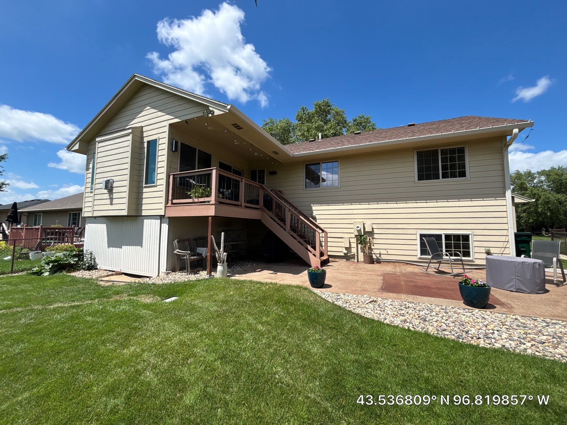 Sioux Falls Exterior Siding Replacement and Custom Deck Upgrade by Select Painting, Coatings & Garage Cabinets