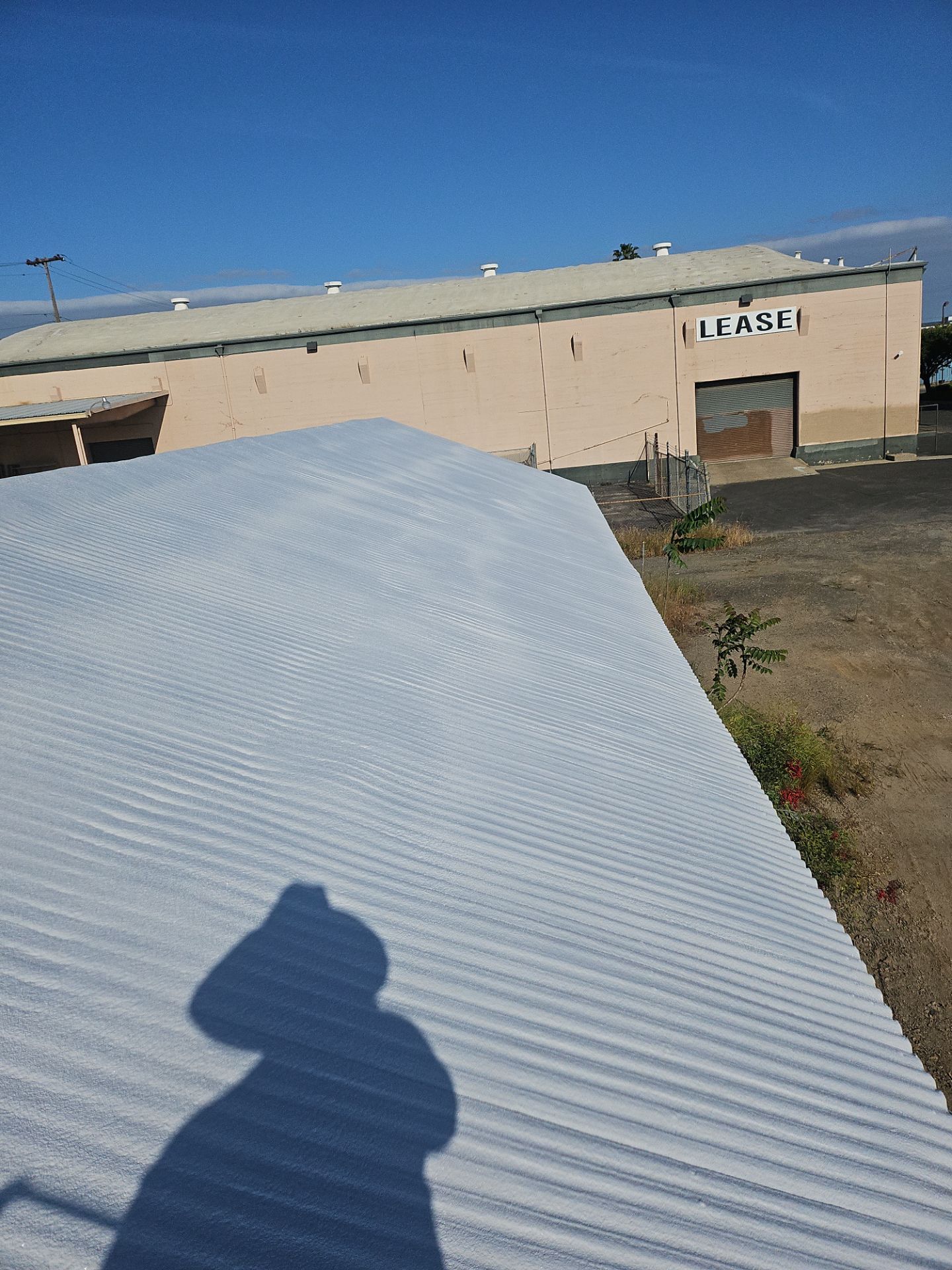 Spray foam and coatings using Conklin Benchmark/PUMA XL by Straight Edge Roofing Inc