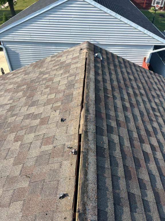 Residential Roofing Repair using Ridge vent replacement by Nitro Roofing and Construction