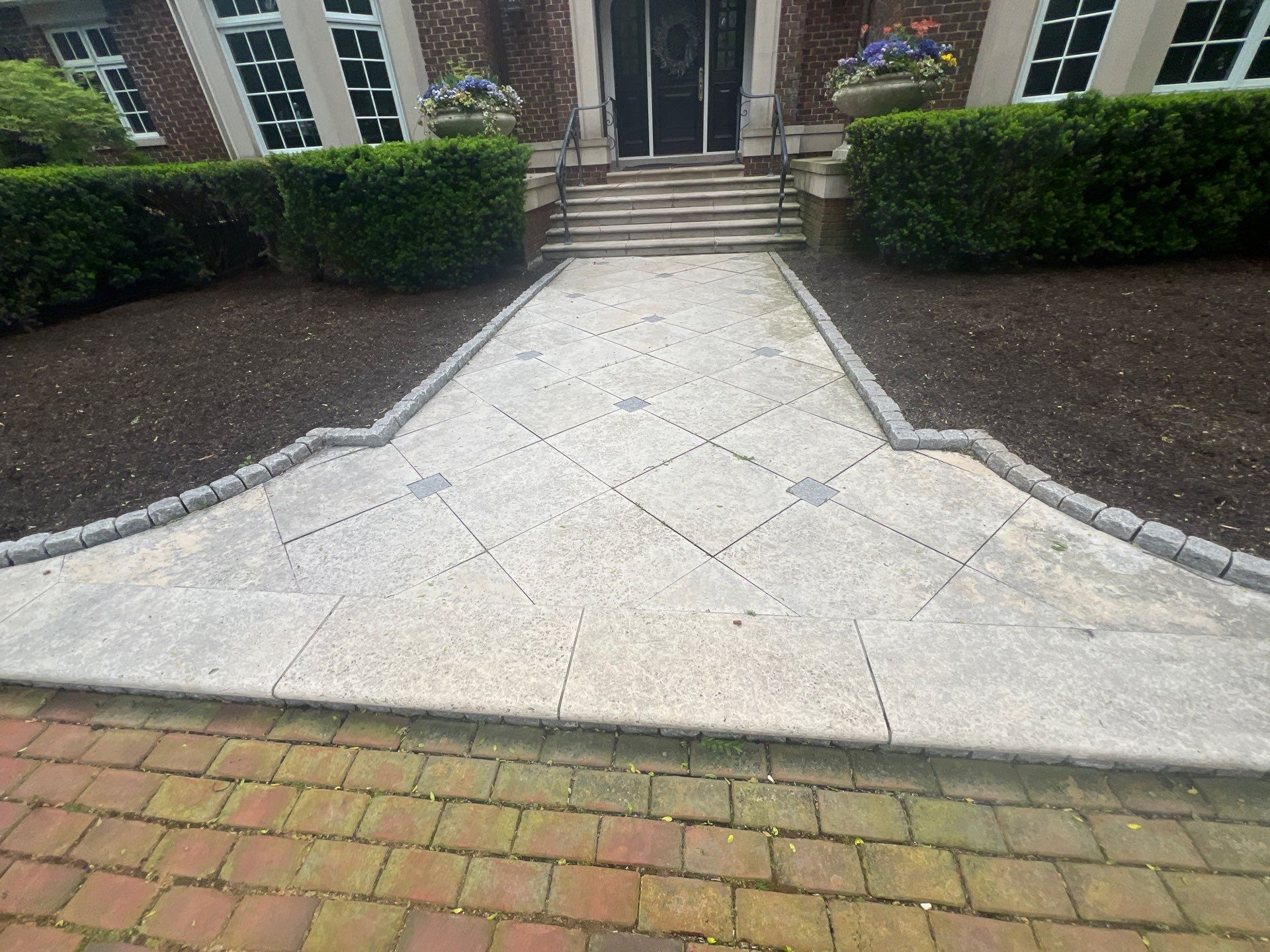 Brick paver clean, sand and seal.  using Algaecide, soft wash soap by Northern Power Washing LLC.