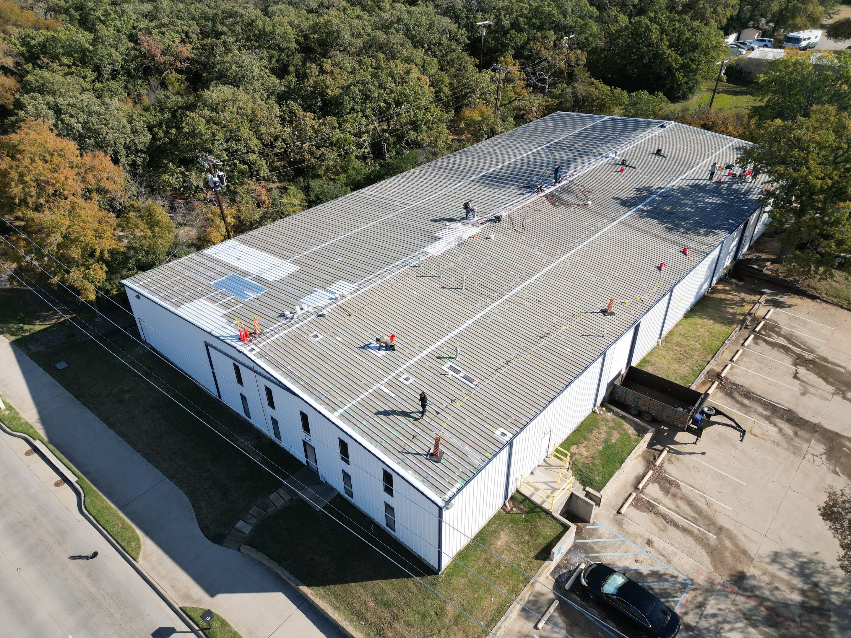 Silicone Coating Metal Rehab by First Out Roofing 