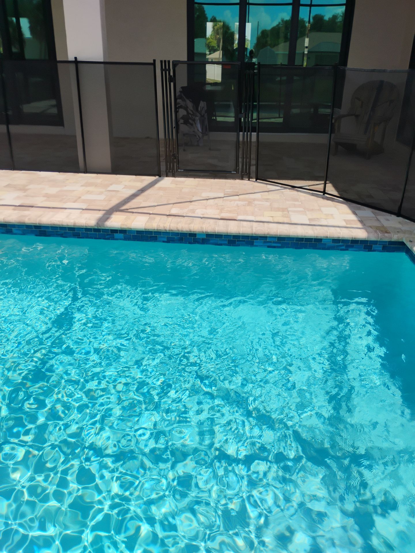 Vinyl Privacy Fencing and Aluminum Pool Security Installation in Port Charlotte by True Fence LLC