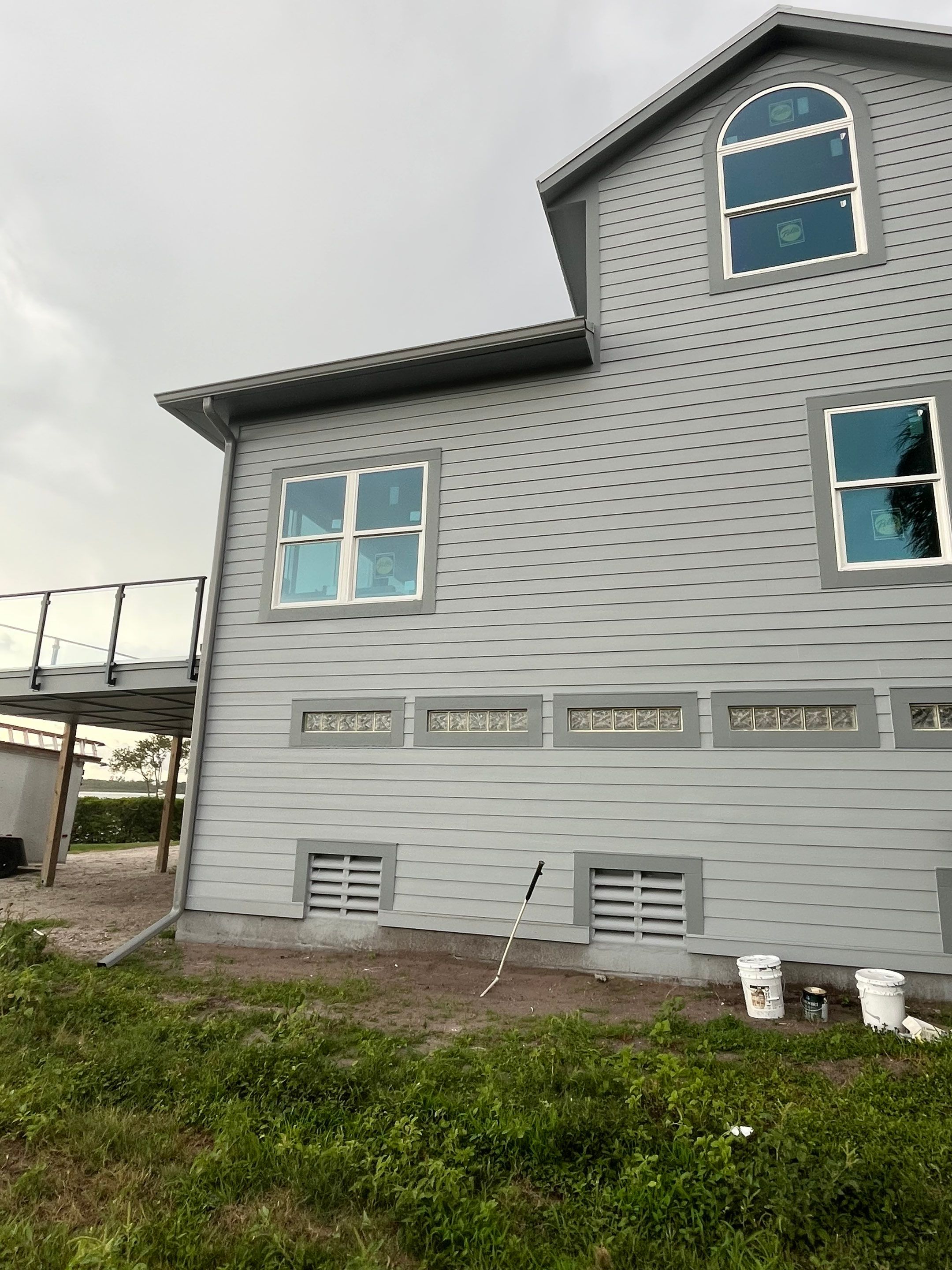 Downspout Installation Dove Grey Palmetto FL by Gutter Professors