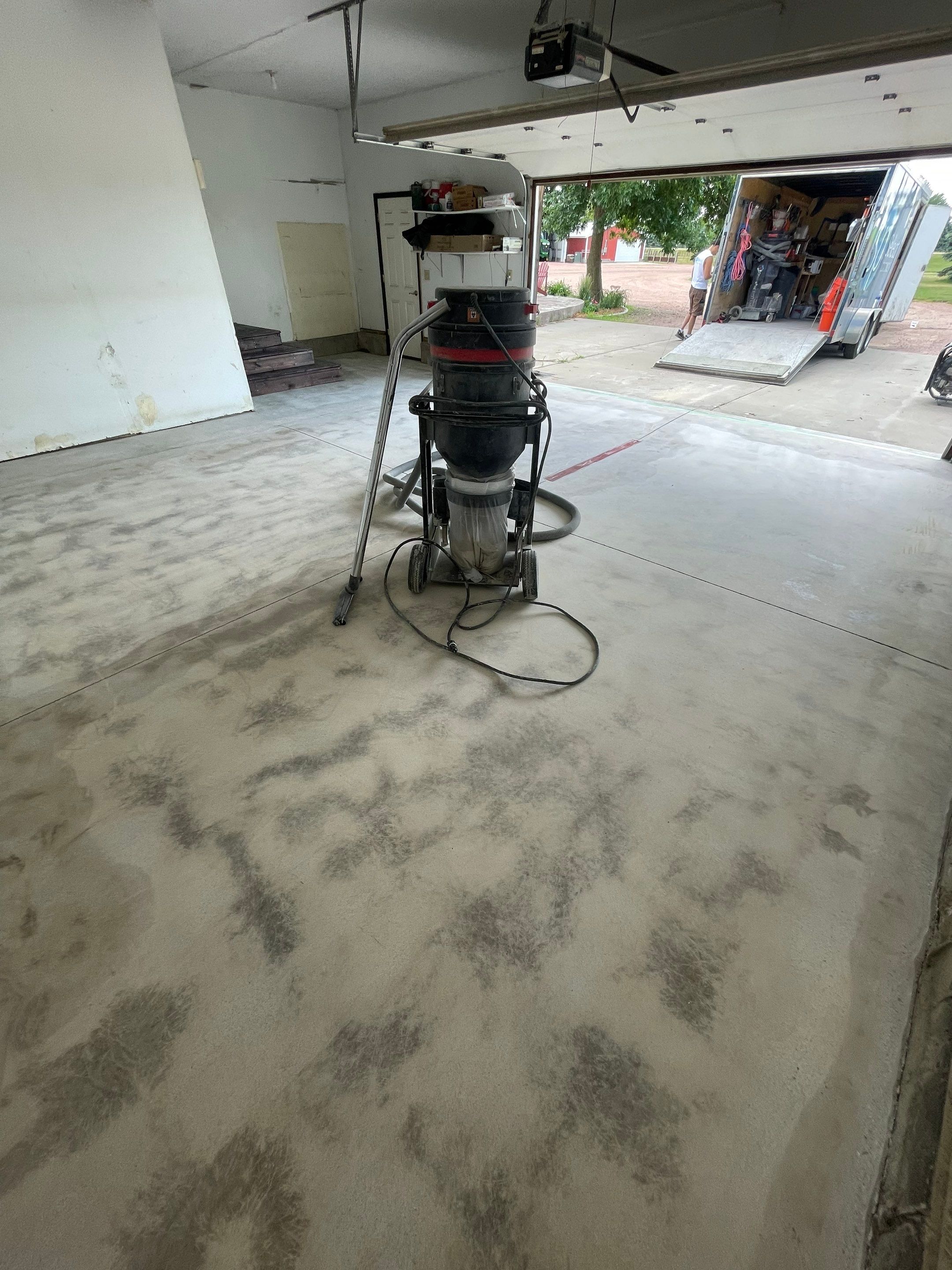 Hartford Residential Garage Floor Transformation With Decorative Chip Coating by Select Painting, Coatings & Garage Cabinets