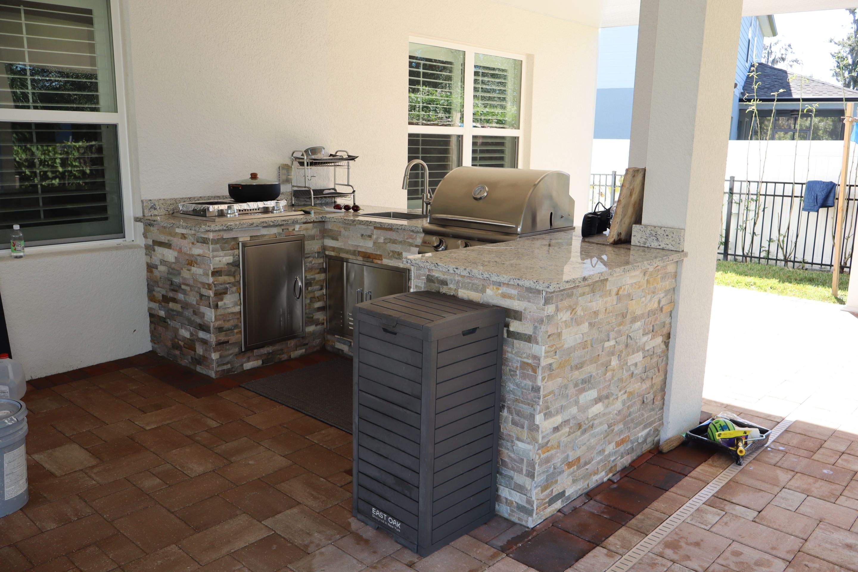 Patio cover with kitchen by Orlando pergolas 