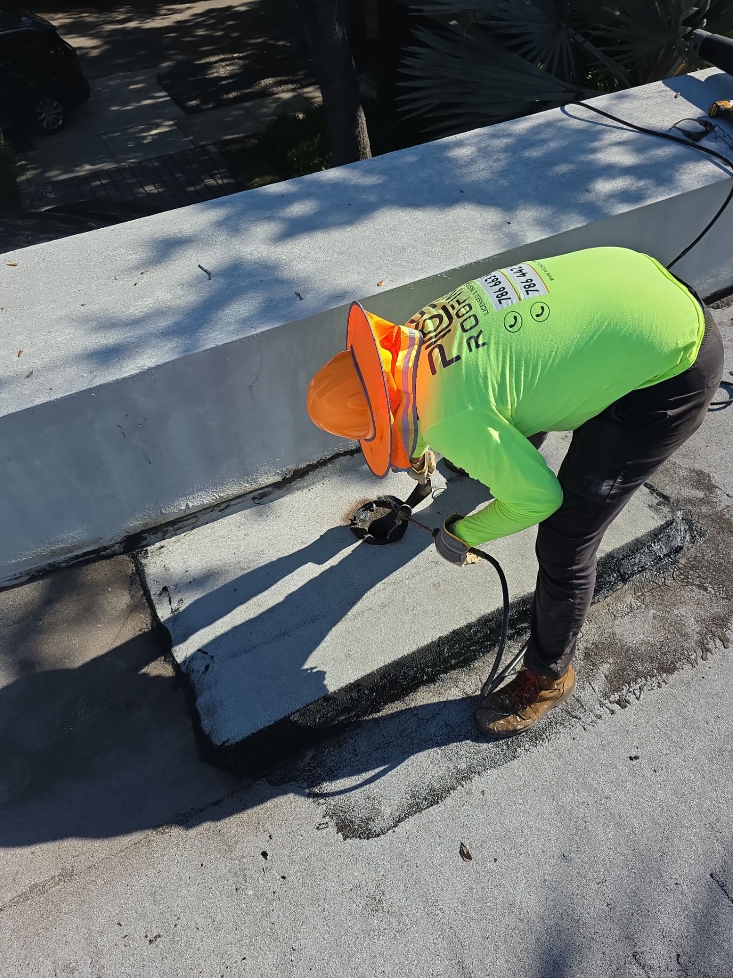 Flat Roof Silicone Coating and Interior Water Damage Restoration in Miami by Picos Construction Engineering