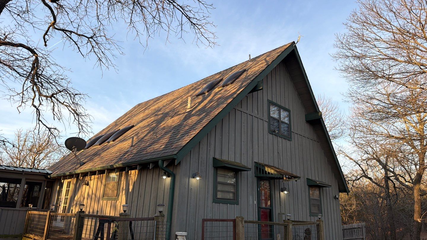 Architectural Shingle Roof Replacement and Skylight Installation in Sulphur by BANA Roofing and Solar Supply