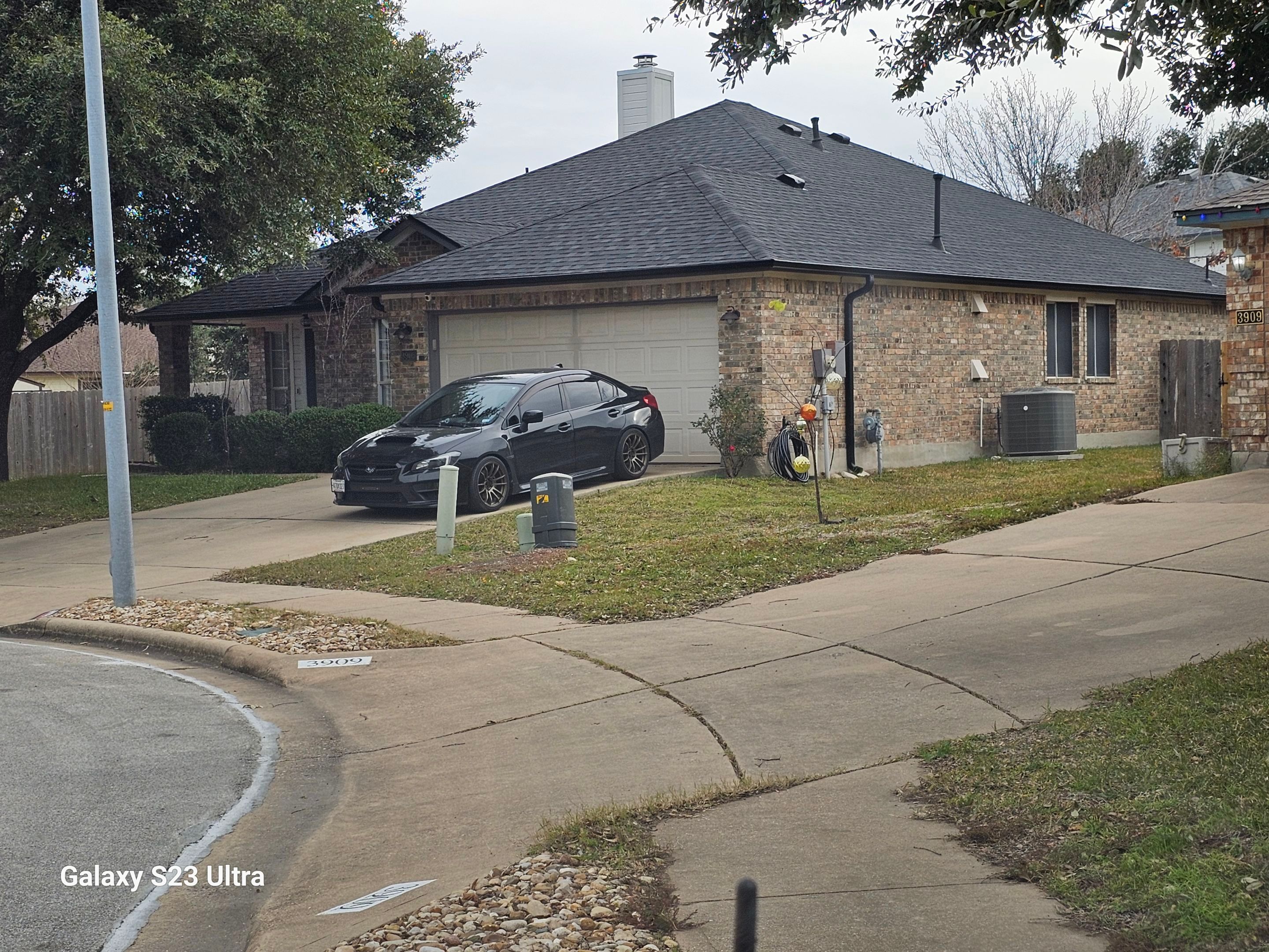 Siding Repair - Gutters - Roof Installation IKO Dynasty Granite Black by DeZign Roofing & Exteriors