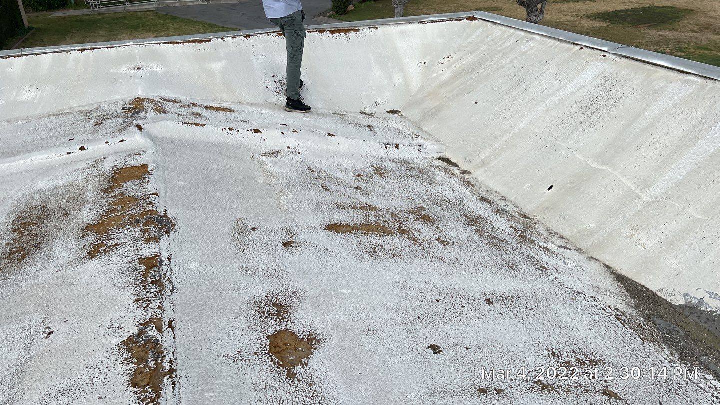 Commercial Roofing Installation using General Coatings acrylic coatings and spray foam by Straight Edge Roofing Inc