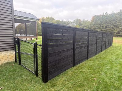 Modern Horizontal Wood Privacy Fence Installation in Cedar Falls
