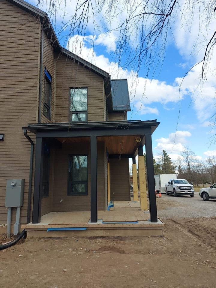 New Home Construction using 16" Standing Seam Panels by Jay Carter Roofing & Sheet Metal