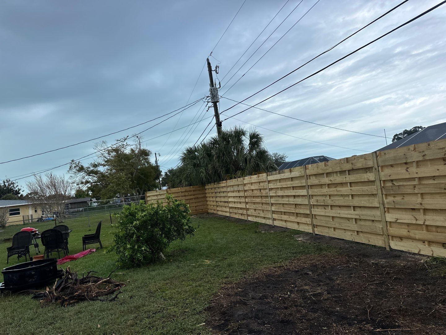 Wood Fence Installation using 6Ft Tall Pressure Treated Wood Privacy Fence by Asap fence and gates, LLC