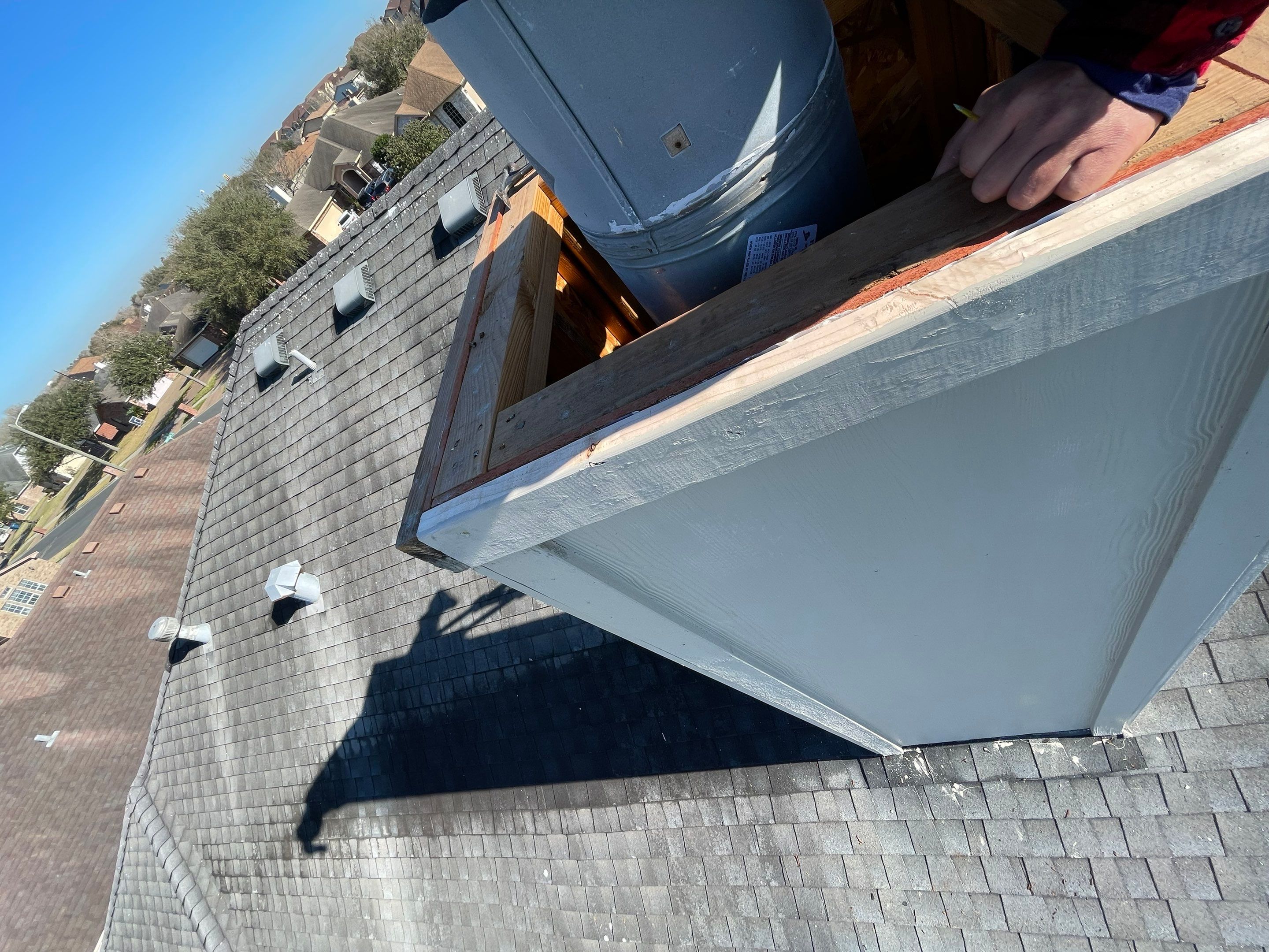 Residential Roofing Repair Replacing Chimney Cap by Lighthouse Roofing