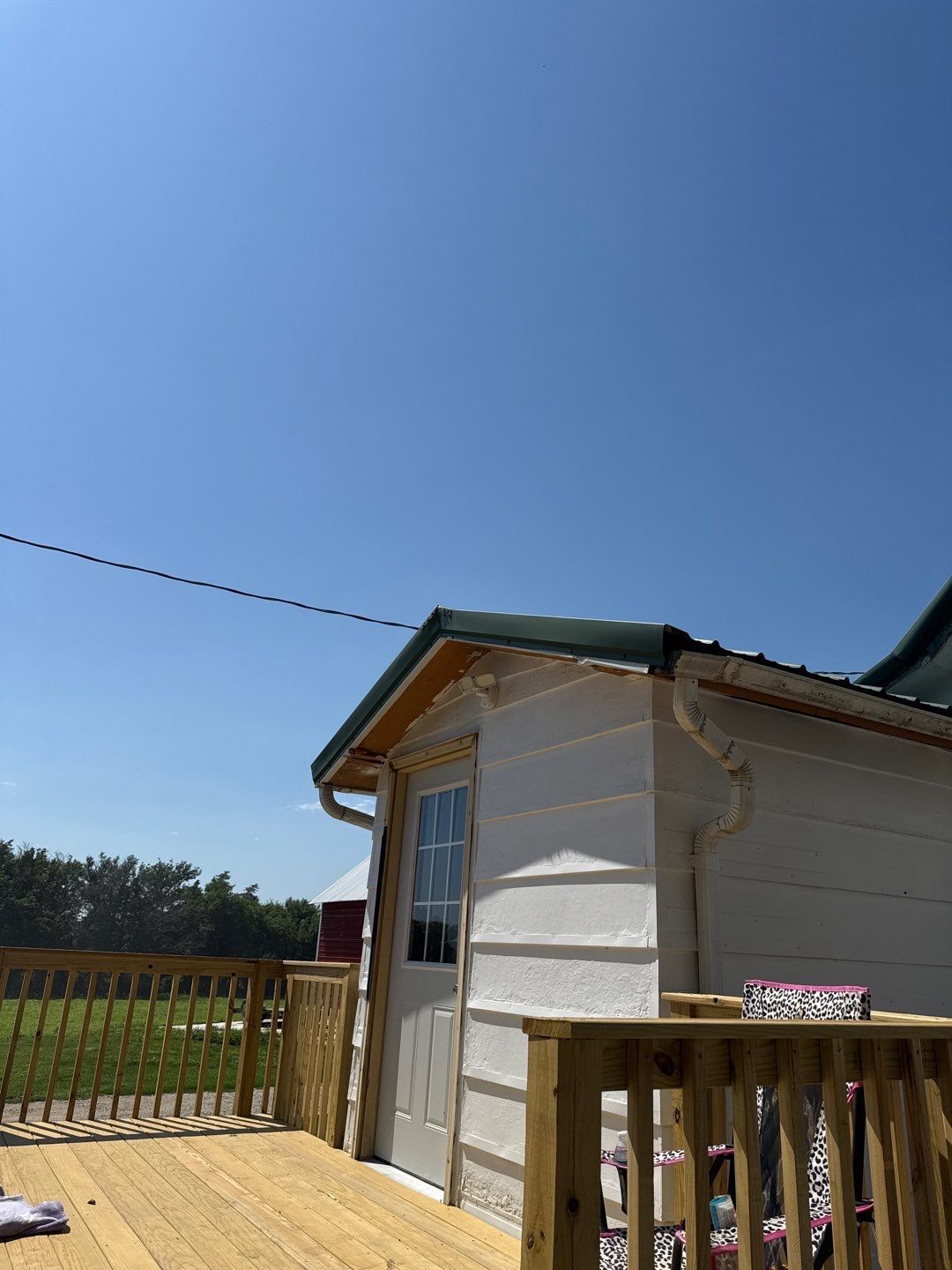 Standing-Seam Metal Roof and Vinyl Siding in Pender, NE by Crows Roofing LLC