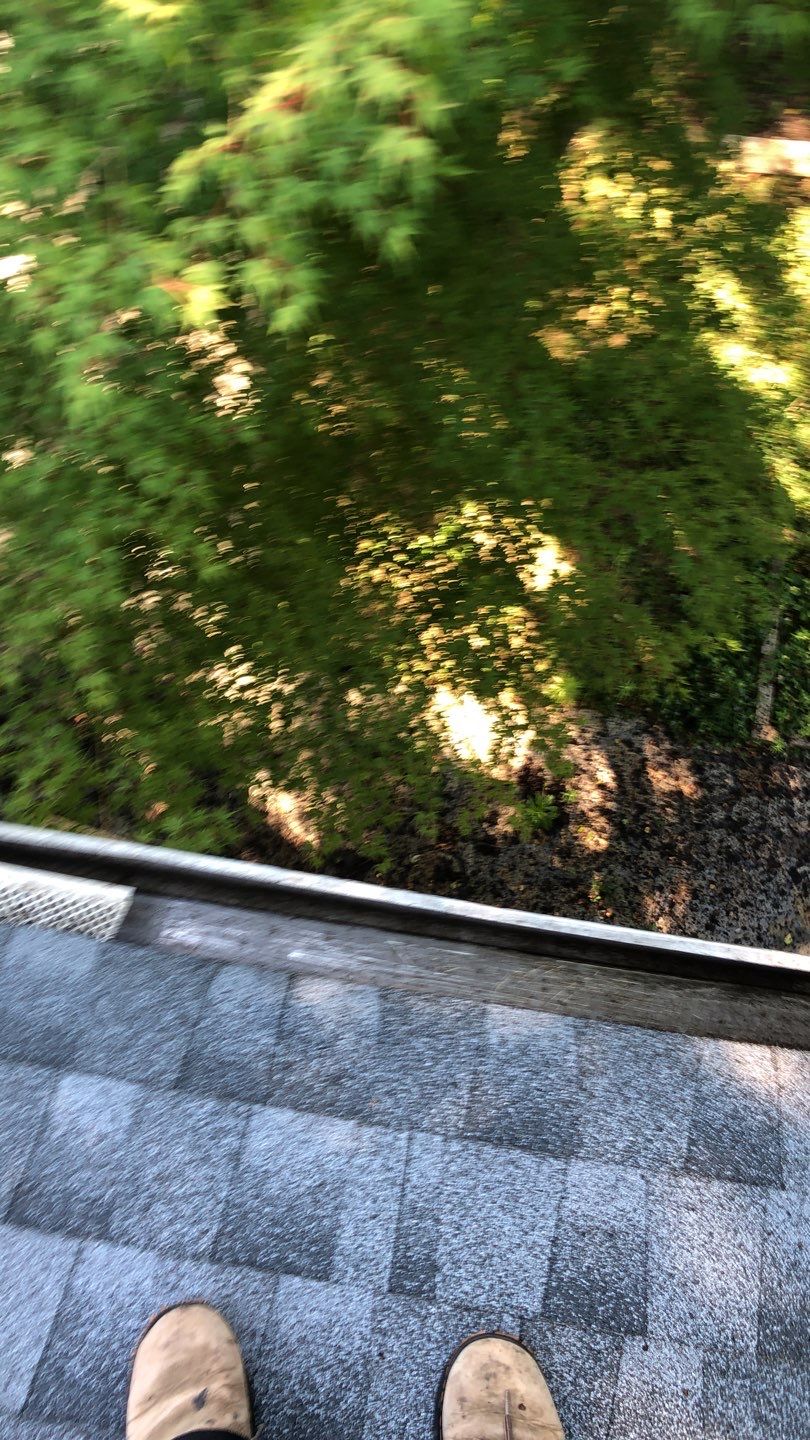 Gutter Cleaning by American Home Contractors