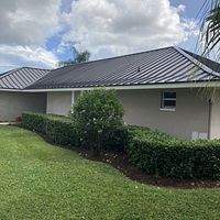 24ga 1.5" Mechanical Seam Dark Bronze by Total Roofing System The Metal Roof Experts