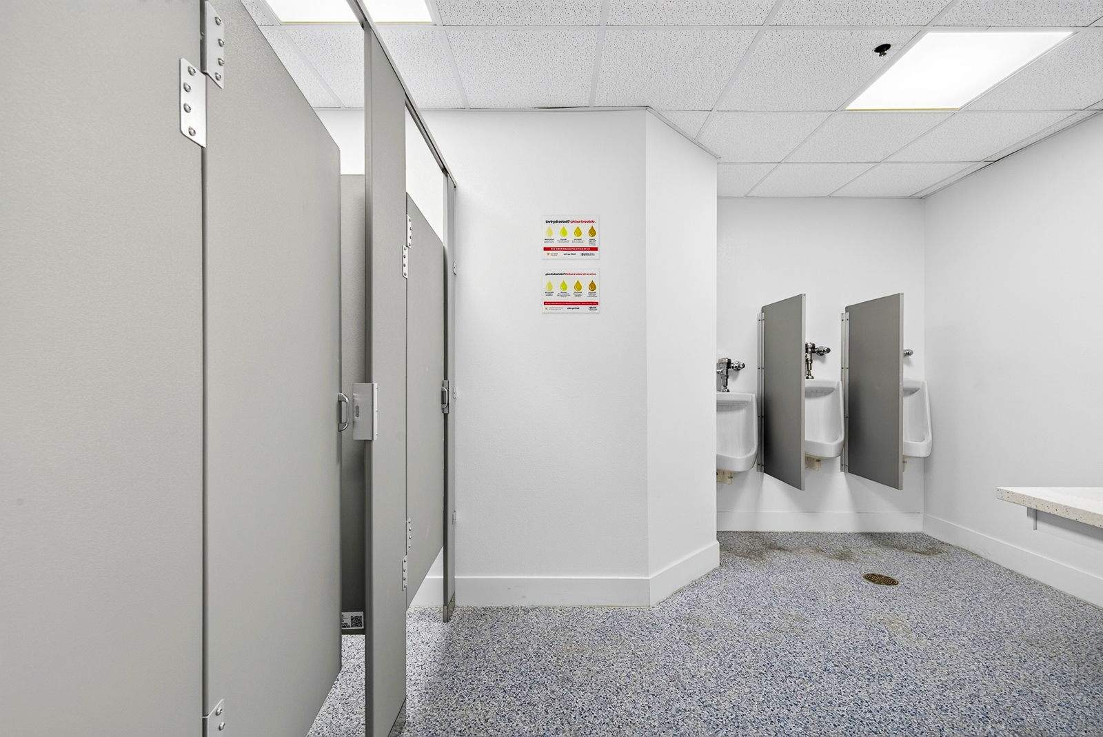 Commercial Restroom Renovation with Epoxy Flooring in Sarasota by Vertical General Contracting 