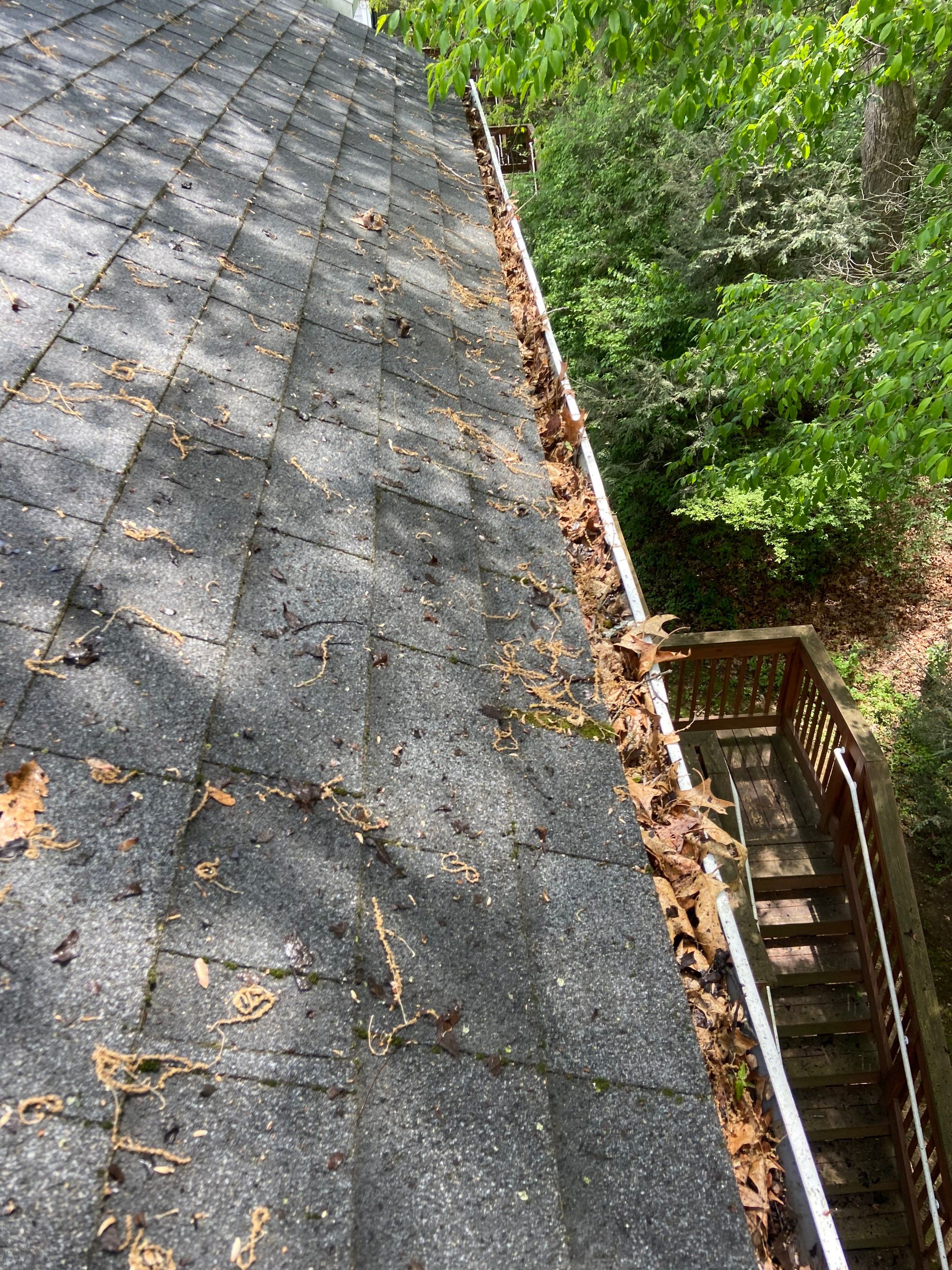 Commercial gutter cleaning State College, PA before photo with filled gutters