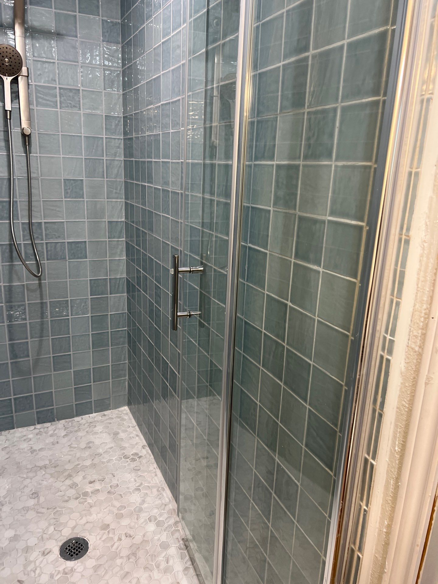Remodeled and expanded Shower by TXN Remodeling n Construction