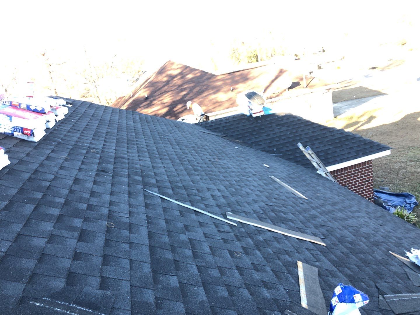Residential Roofing Installation using Roof Replacement by American Roofing & Construction LLC