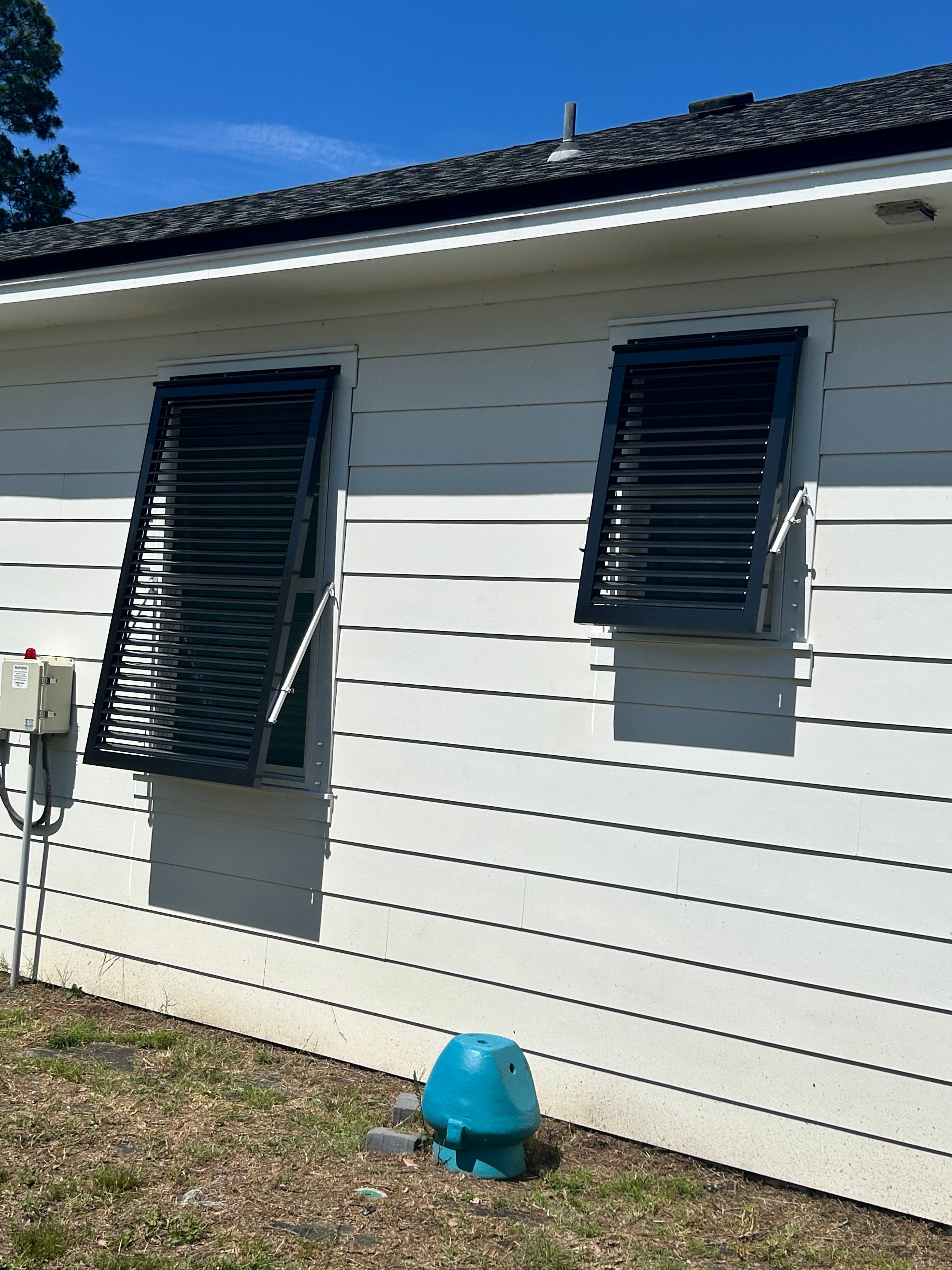 Custom Aluminum Bahama Shutters and Storm Protection in Santa Rosa Beach by Brannan Aluminum Inc.