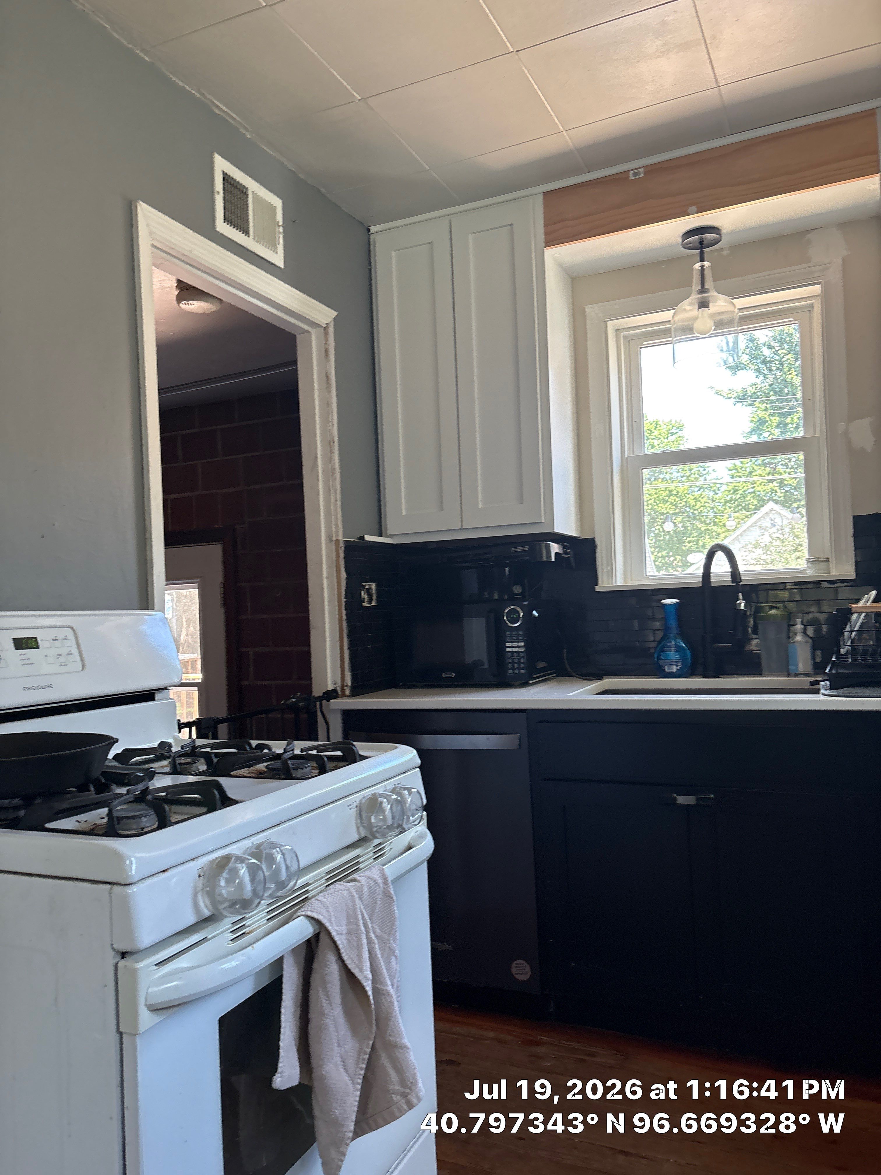 Two-Tone Kitchen Cabinetry and Appliance Service in Lincoln by CompanyCam Sales Demo
