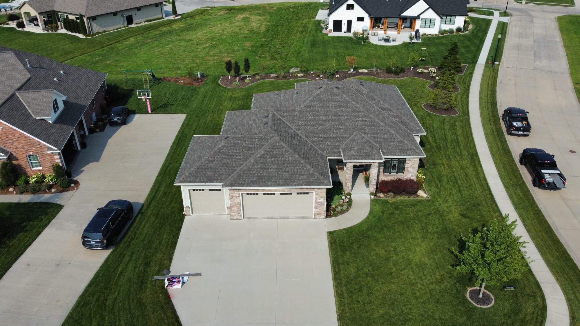 Residential Roofing Installation using TAMKO TITAN WEATHERED WOOD by Lightning Exteriors
