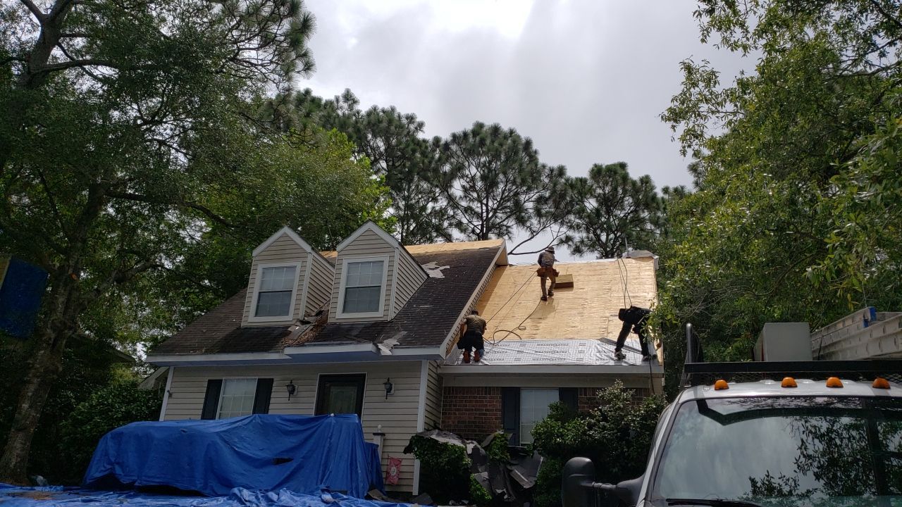 Residential Roofing Installation using Roof Replacement by American Roofing & Construction LLC