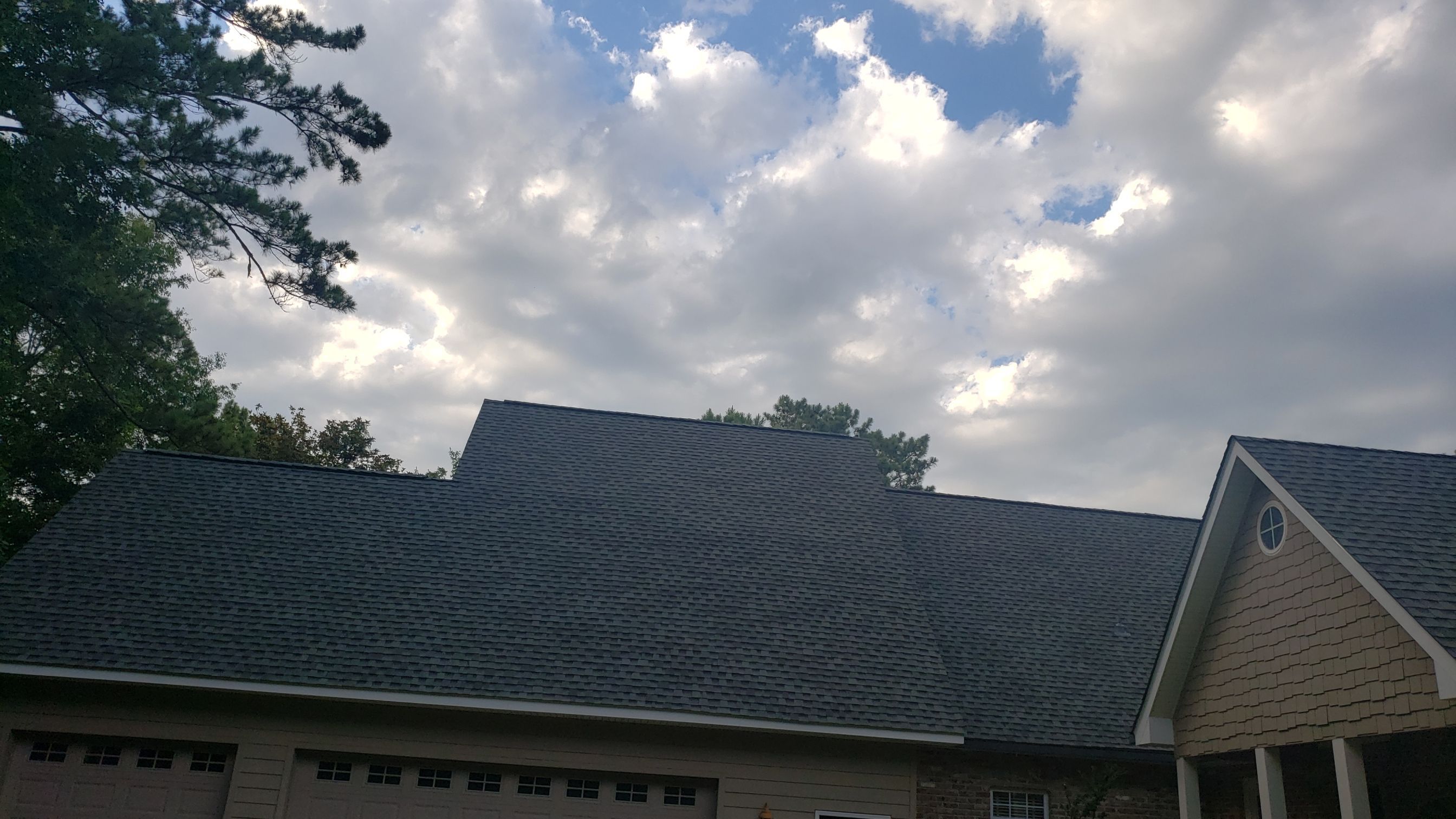 Residential Roofing Installation using Roof Replacement by American Roofing & Construction LLC