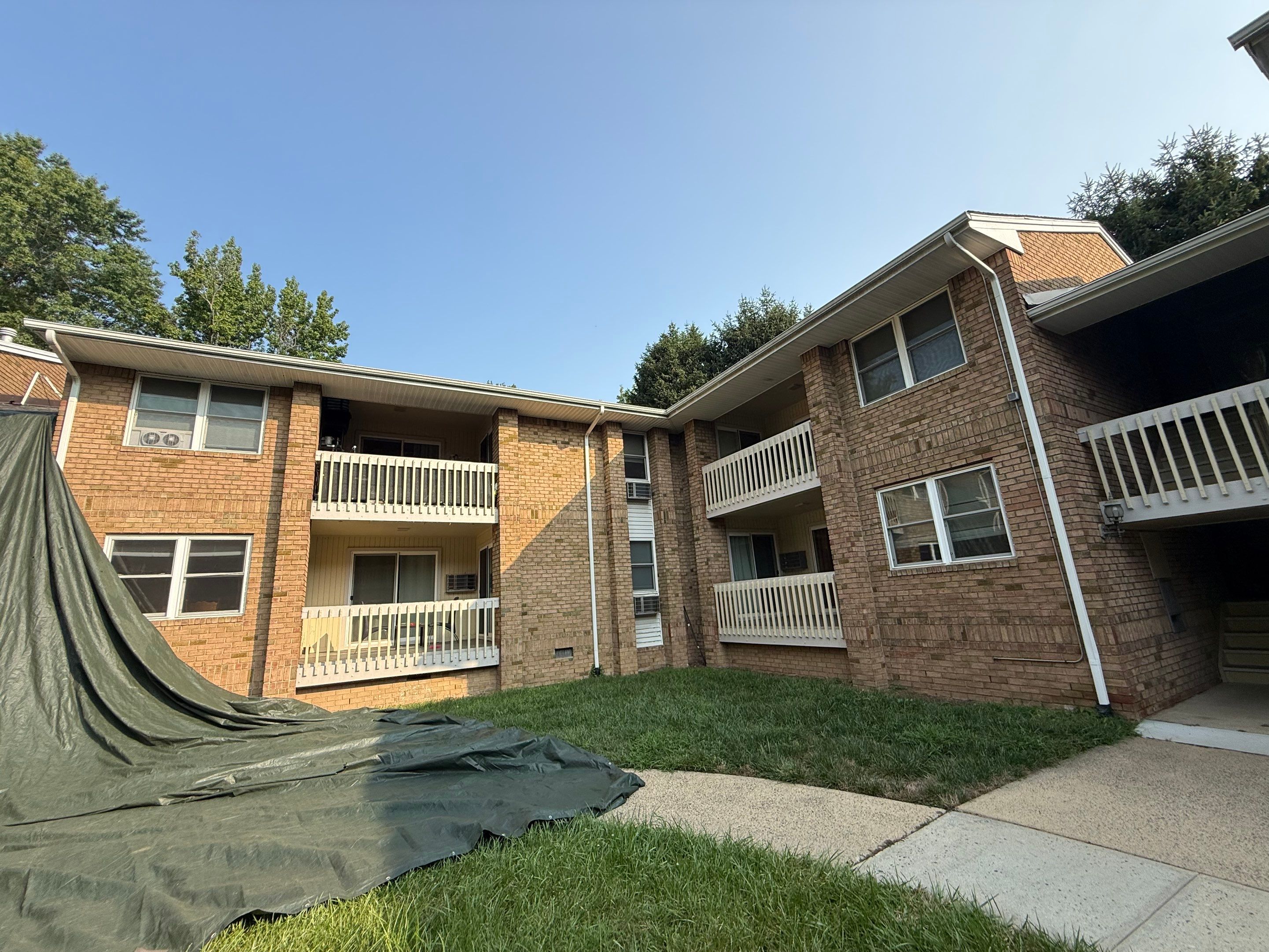 Apartment Complex Roof Replacement and Decking Repair in North Brunswick by JVW ROOFING