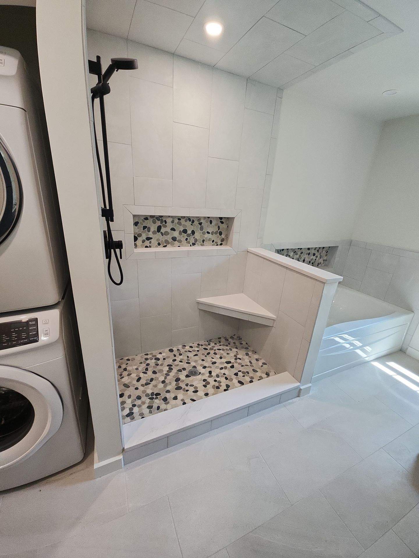 Frameless Shower Enclosure w/Header Bar by Cheshire Glass Company