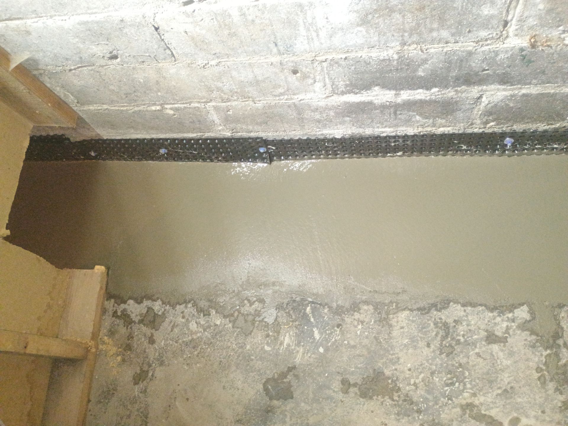 Interior Drain Tile for a South Minneapolis Basement by Waterproofing Northeast