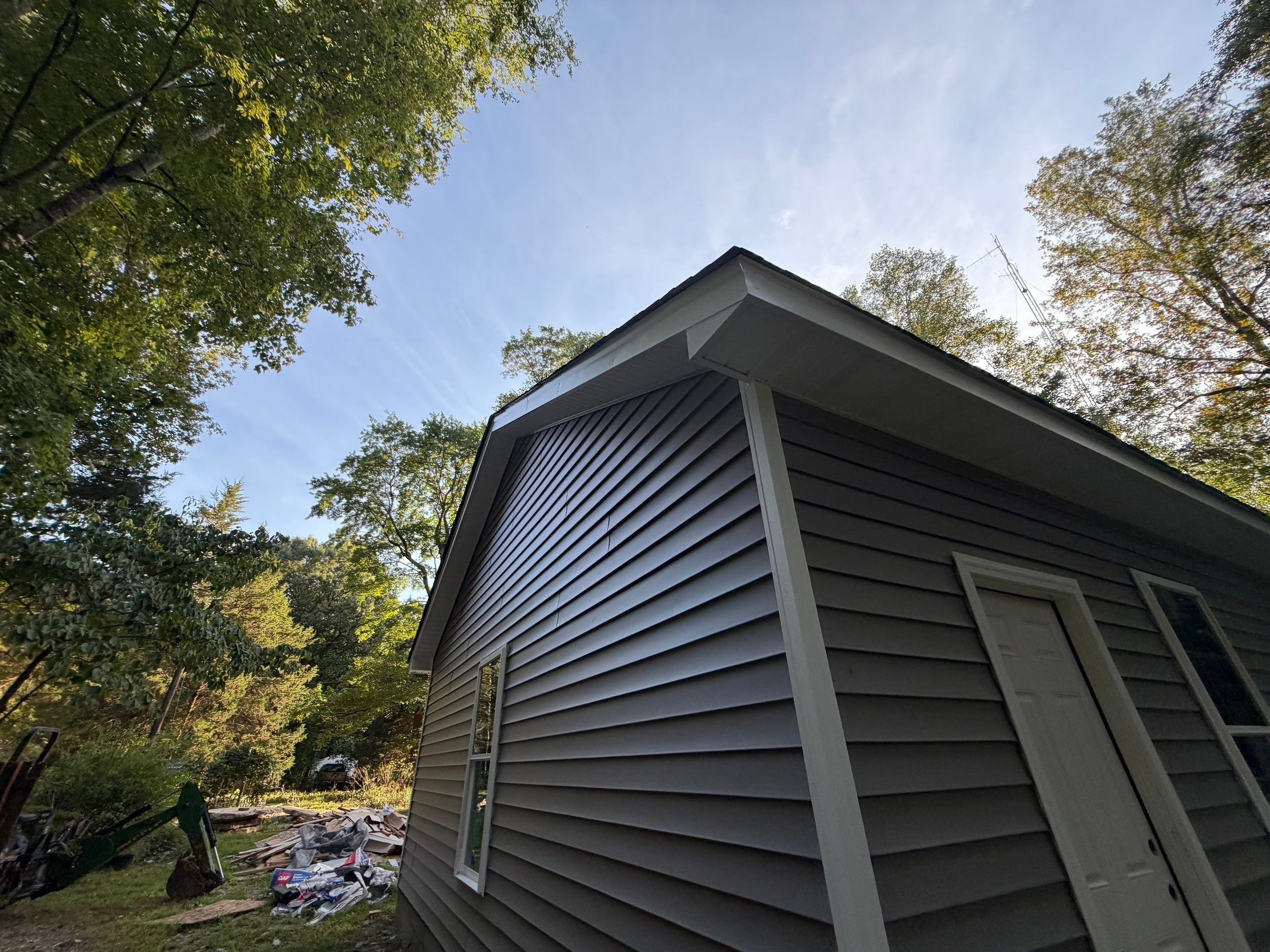 Single-Story New Construction Vinyl Siding Install in Gloucester by Cade Construction
