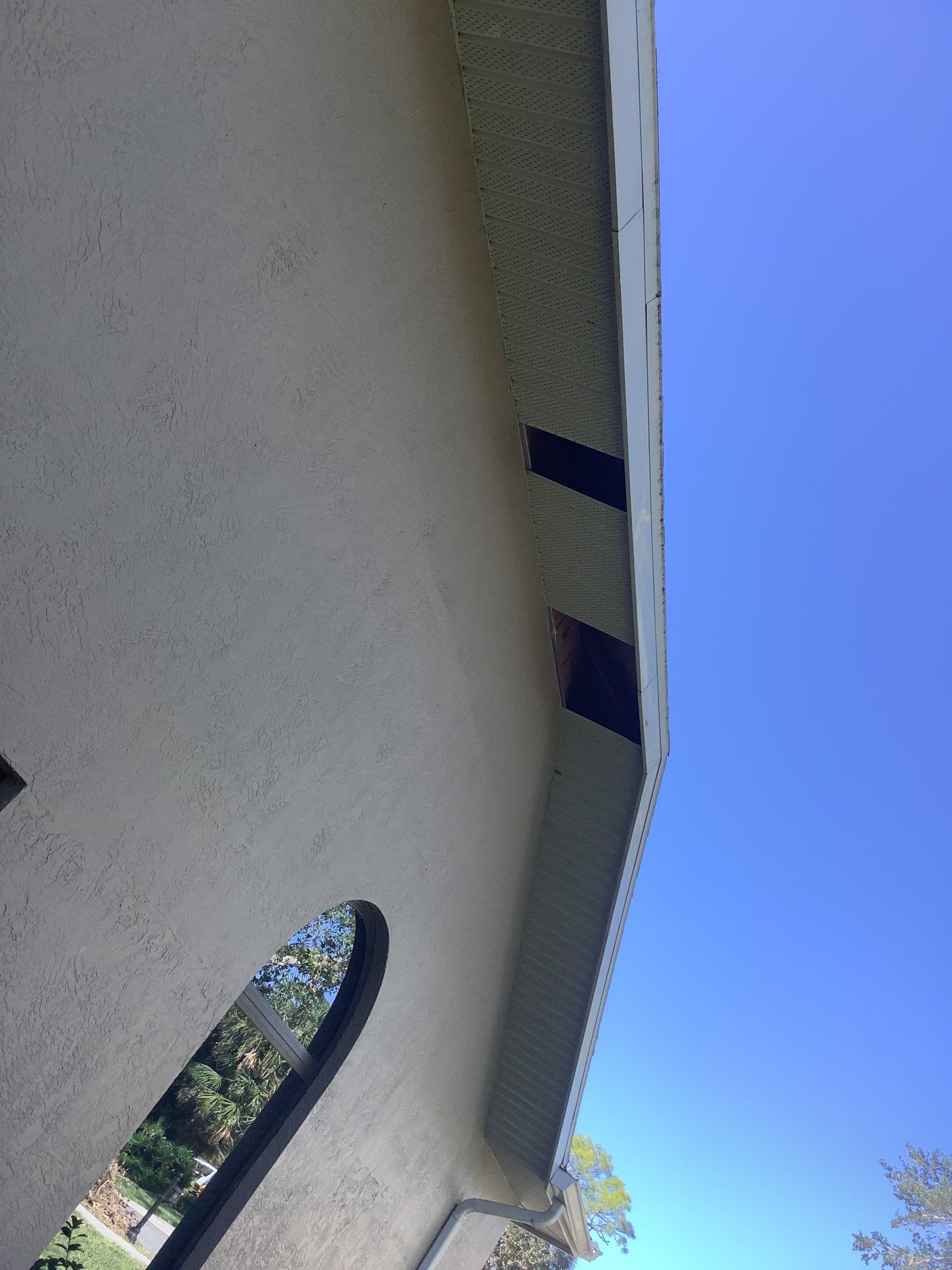 Black Seamless Gutters in Sarasota FL by Gutter Professors