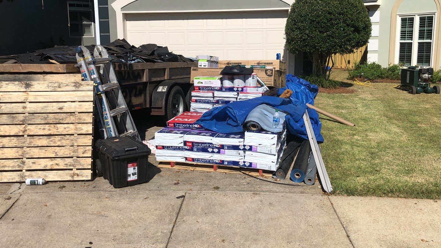Residential Roofing Installation using Roof Replacement by American Roofing & Construction LLC