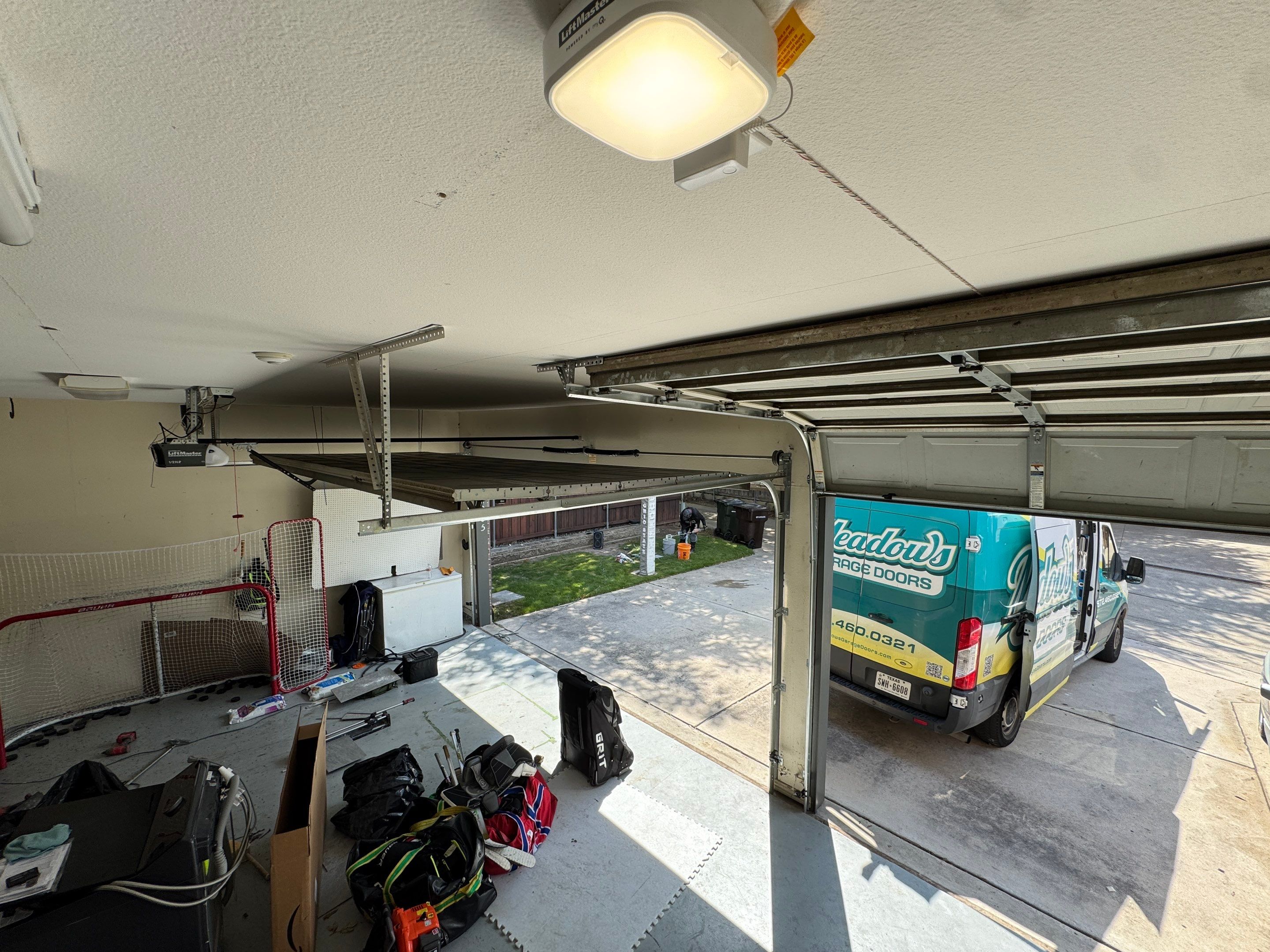 LiftMaster Side Mount Opener and High-Lift Track Installation in Plano by Meadows Garage Doors