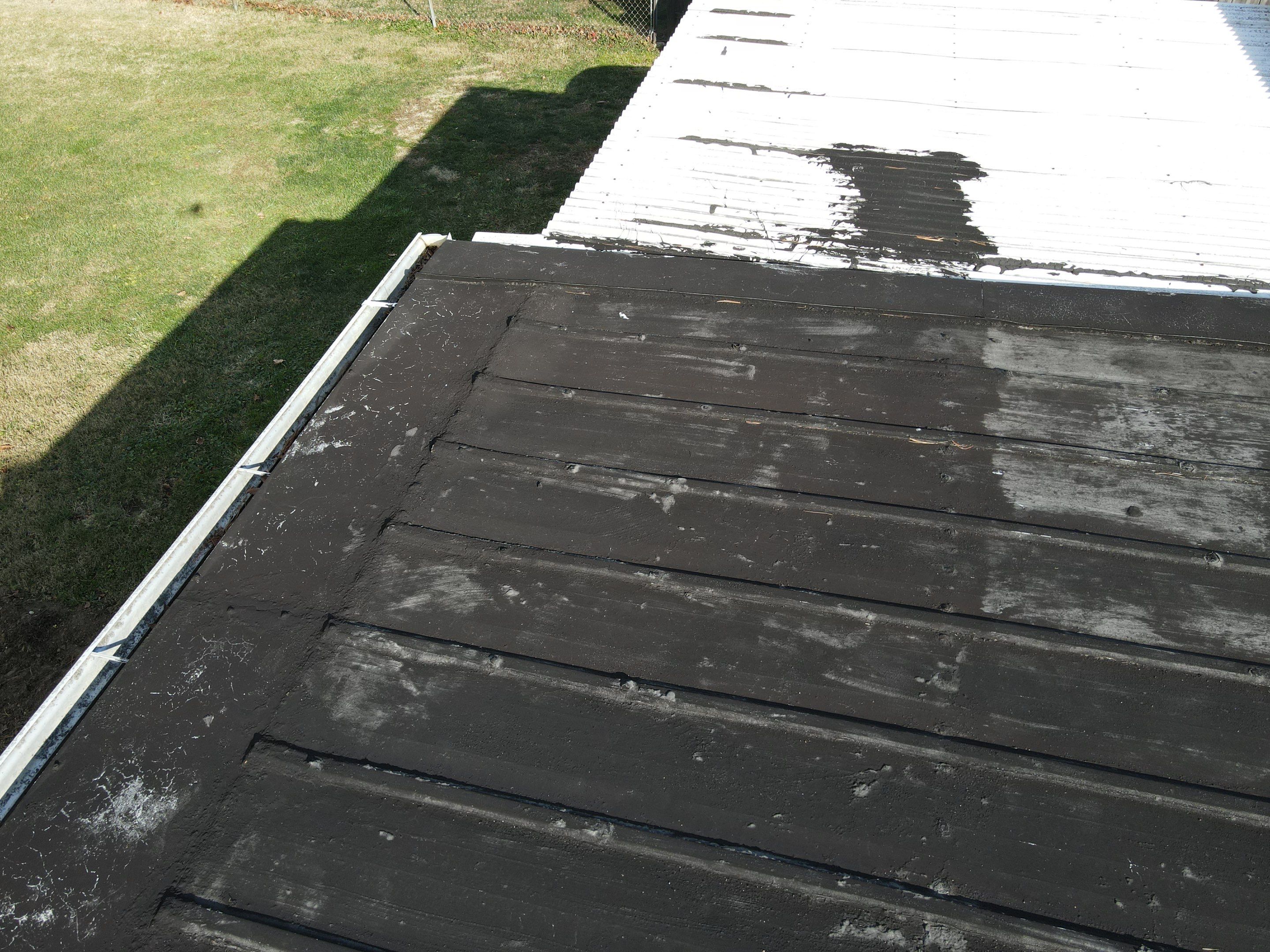 Residential Roofing Installation using Perfromance Panel Metal - Black by RoofX 