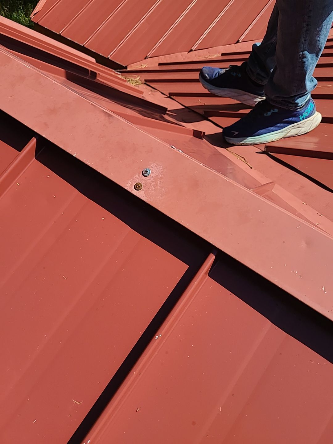Residential Roofing Installation using Standing Seam Metal by Blue Peaks Roofing LLC 