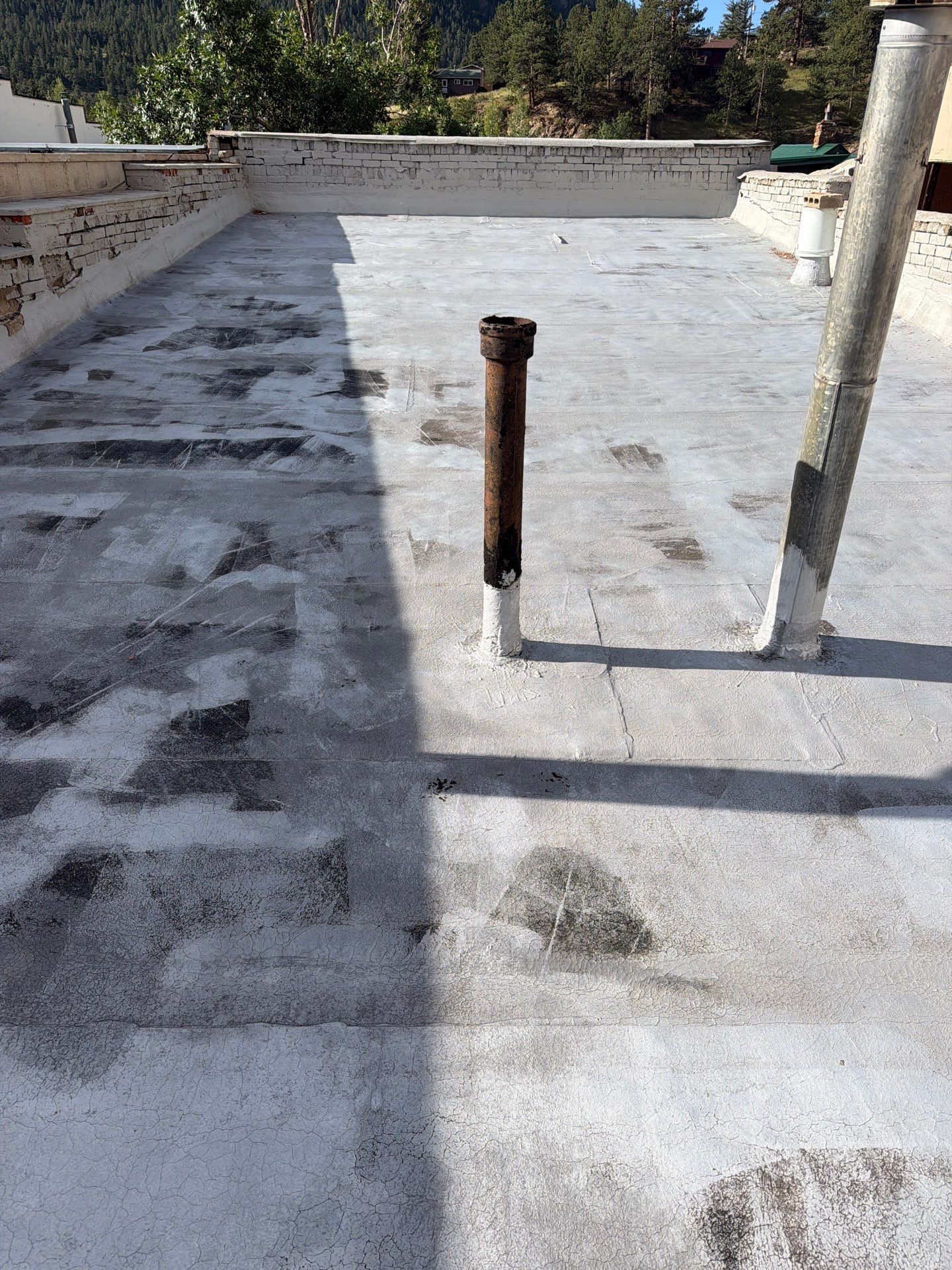 Estes Park "The Taffy Shop" Before & After Gaco Coating by Blue Peaks Roofing LLC