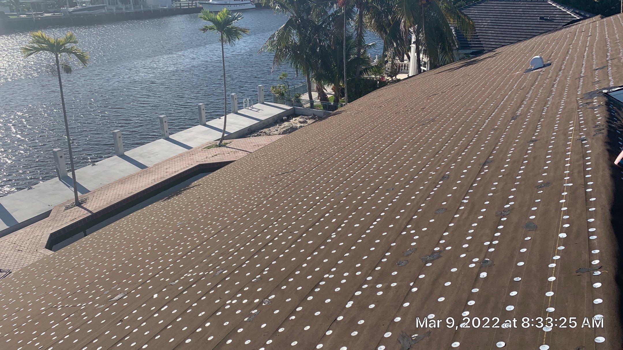 Residential Roofing Installation using 1" Nail strip metal roof by BLUES BROTHERS ROOFING
