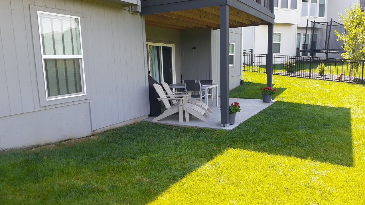 Back Yard Paver Patio by LAND ESCAPES LLC