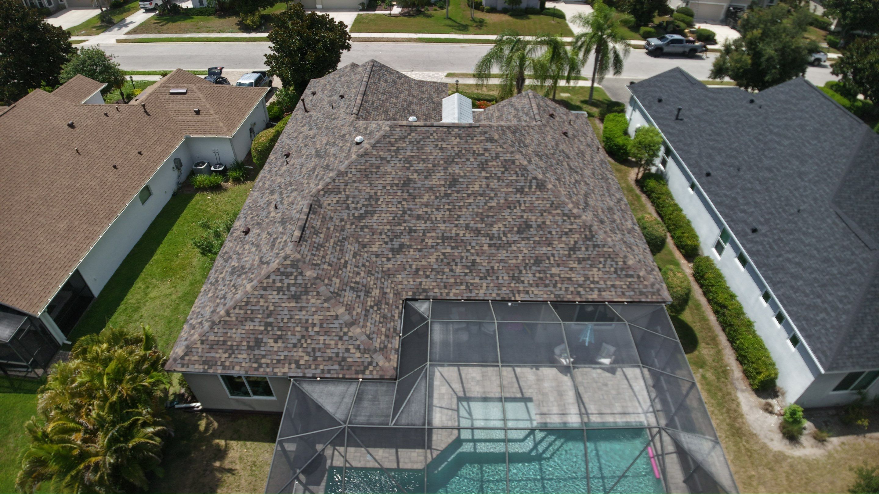 Architectural Summer Harvest Asphalt Shingle Roof Replacement in Bradenton, Florida by Trinity Restoration and Roofing LLC