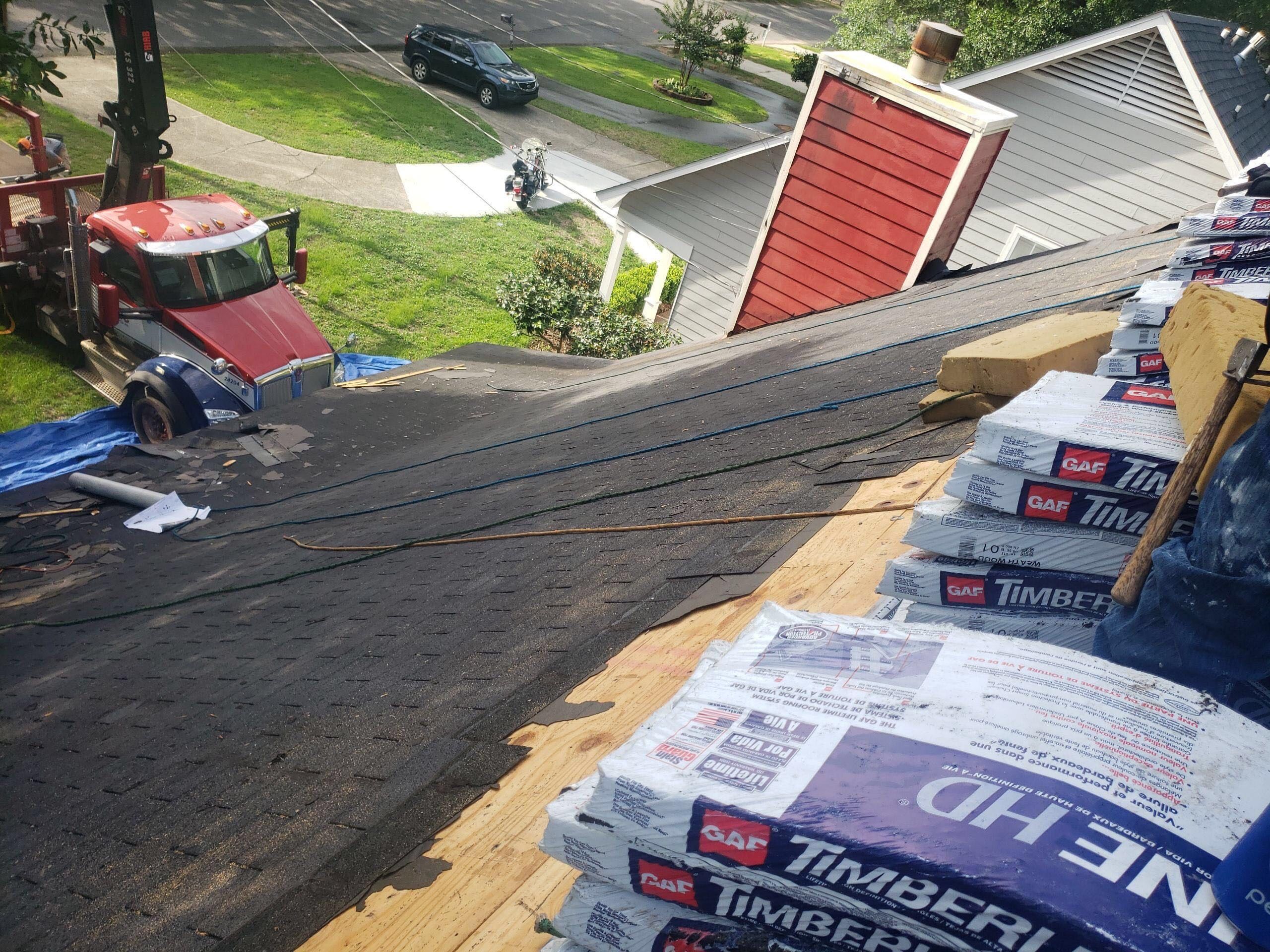 Residential Roofing Installation using Roof Replacement by American Roofing & Construction LLC