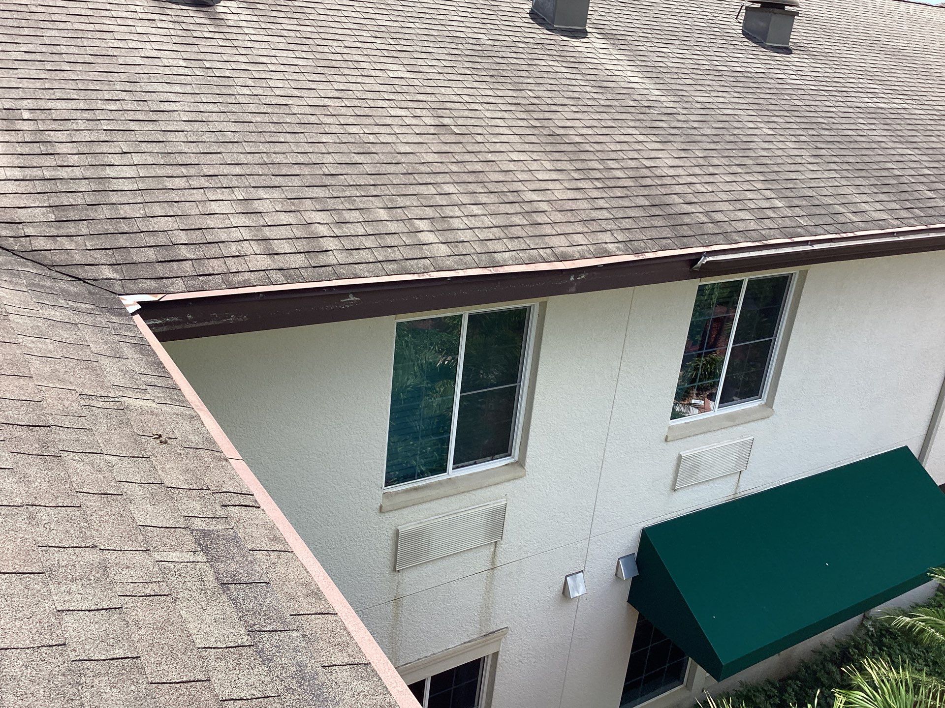Musket Brown Seamless Gutters using Musket Brown Seamless Gutters in Capen Coral FL by Gutter Professors