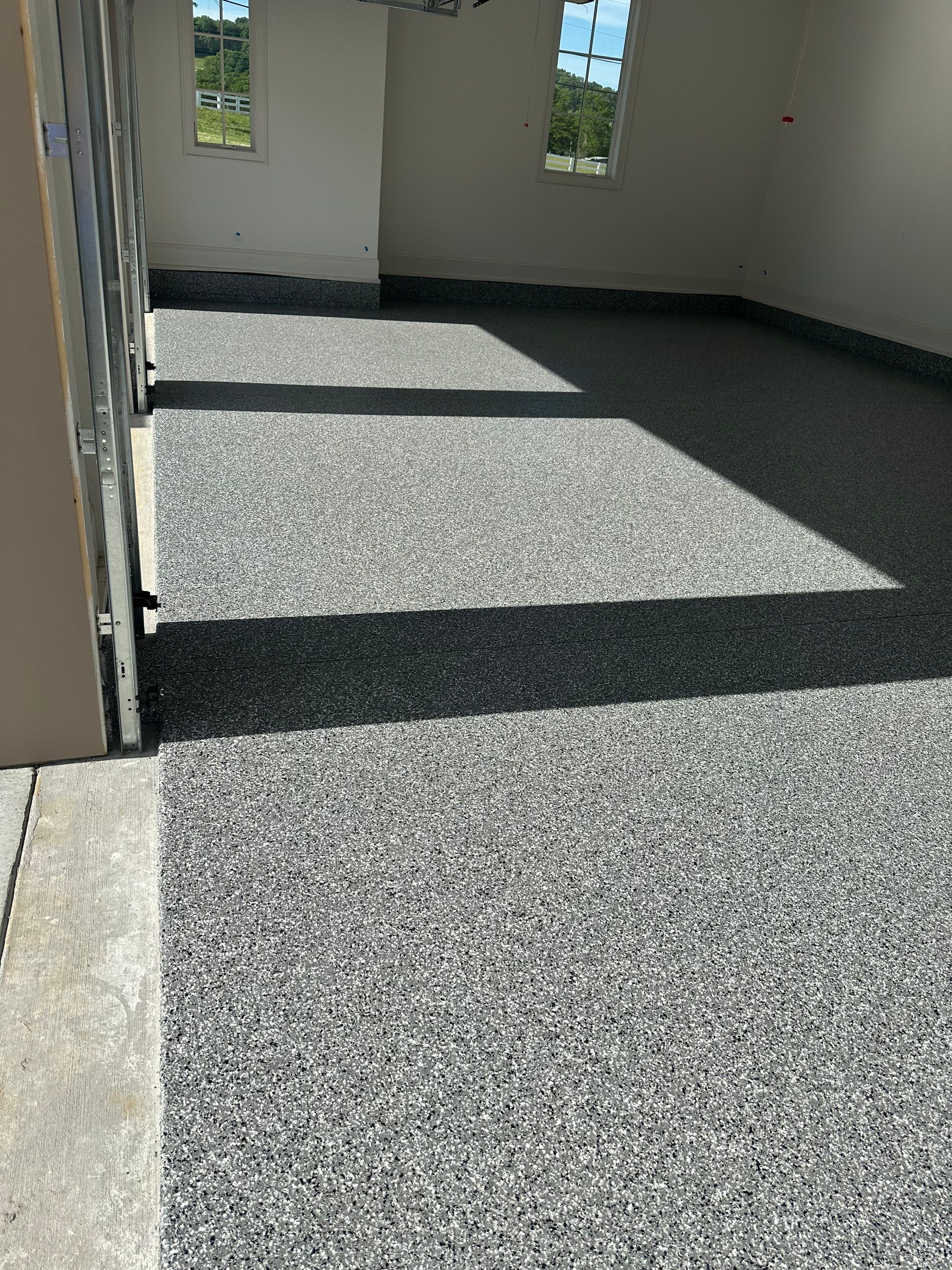 Garage Floor Coating using Wombat by My Garage Floor Guys