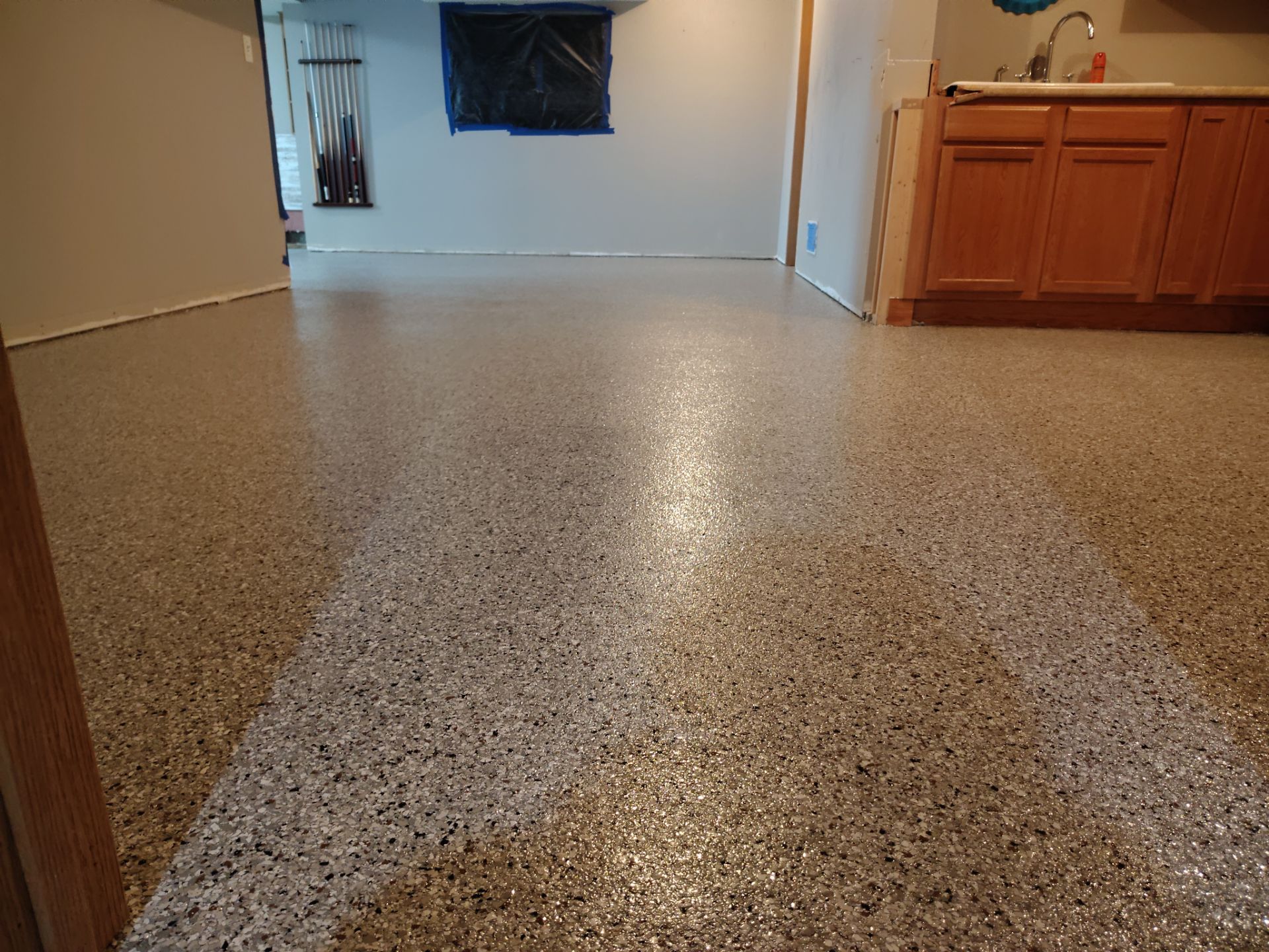 Maxwell, IA Coyote Flake Garage and Basement by Revival Concrete Coatings
