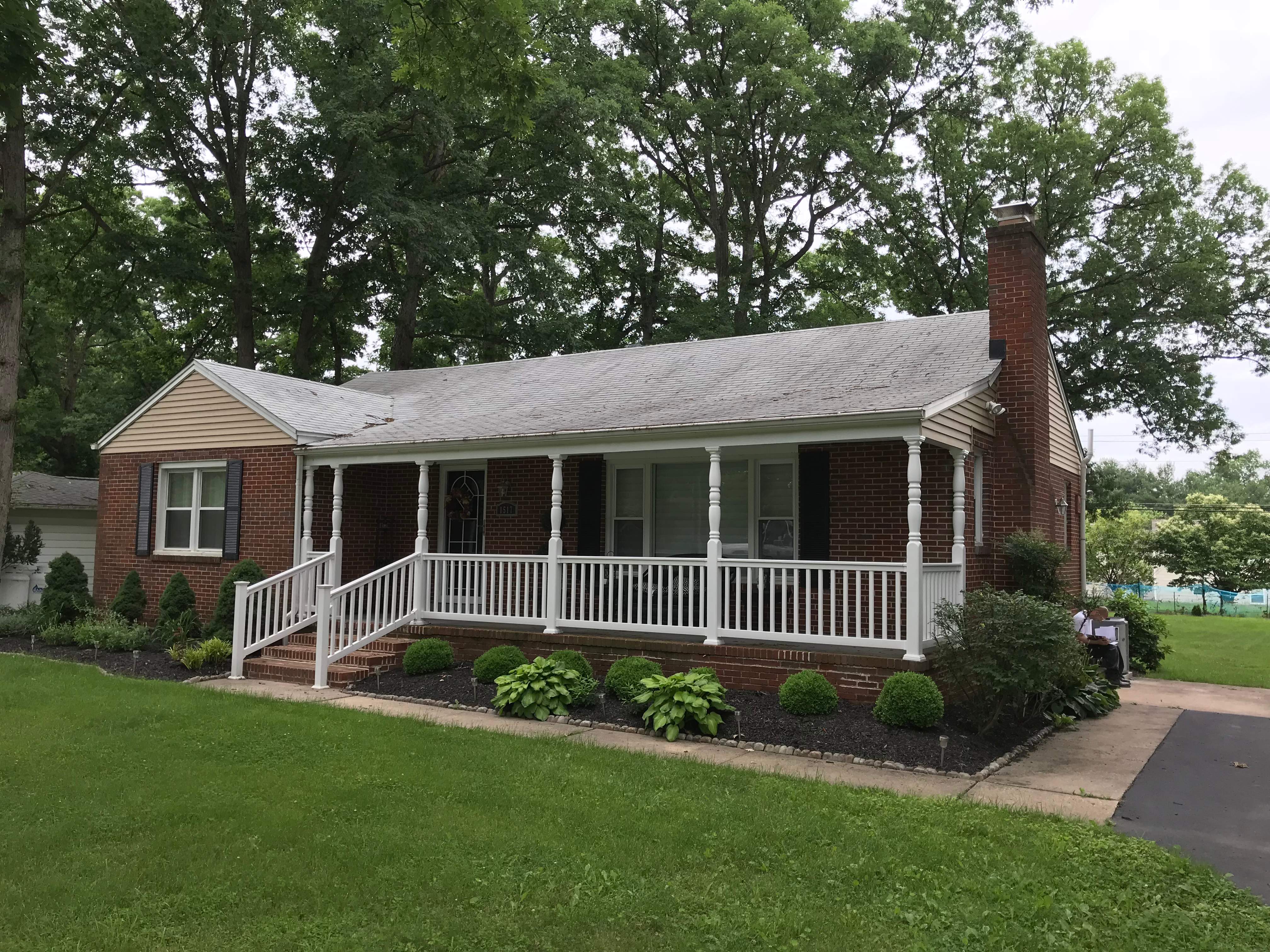 Residential Roofing Installation using Charcoal Black by Alpha Design Services