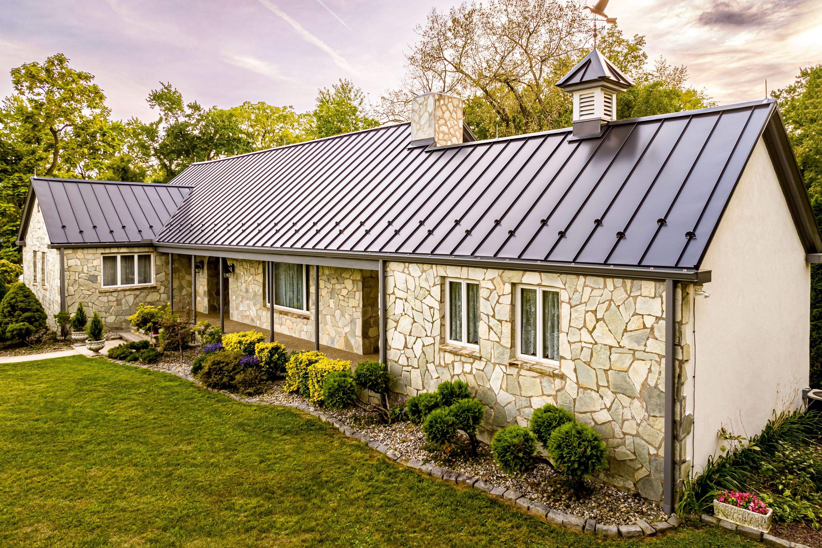 Standing Seam Metal roof-black by Esh Builders