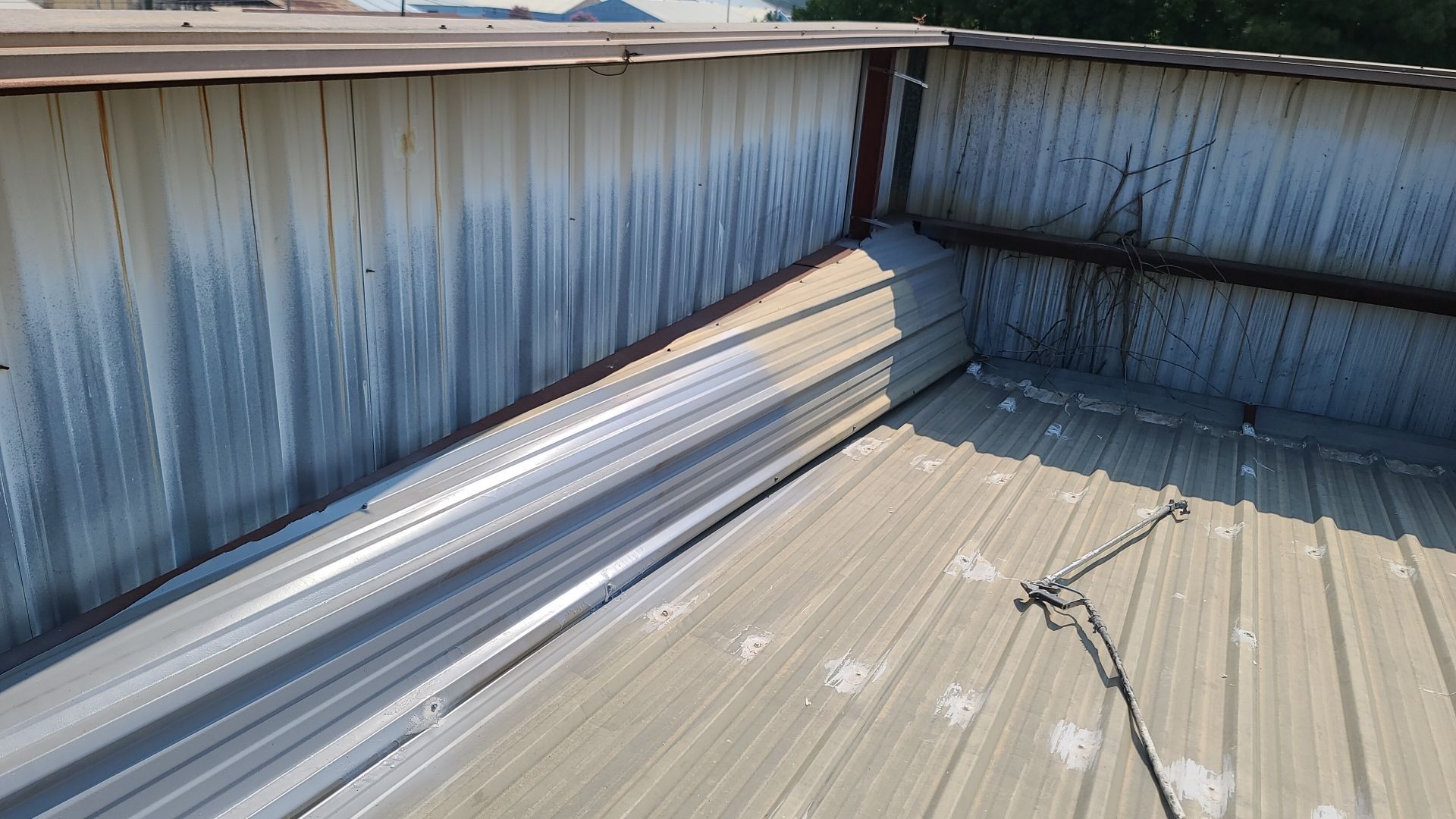Commercial Roofing Installation using Aldocoat Coatings by Hostetler Roofing