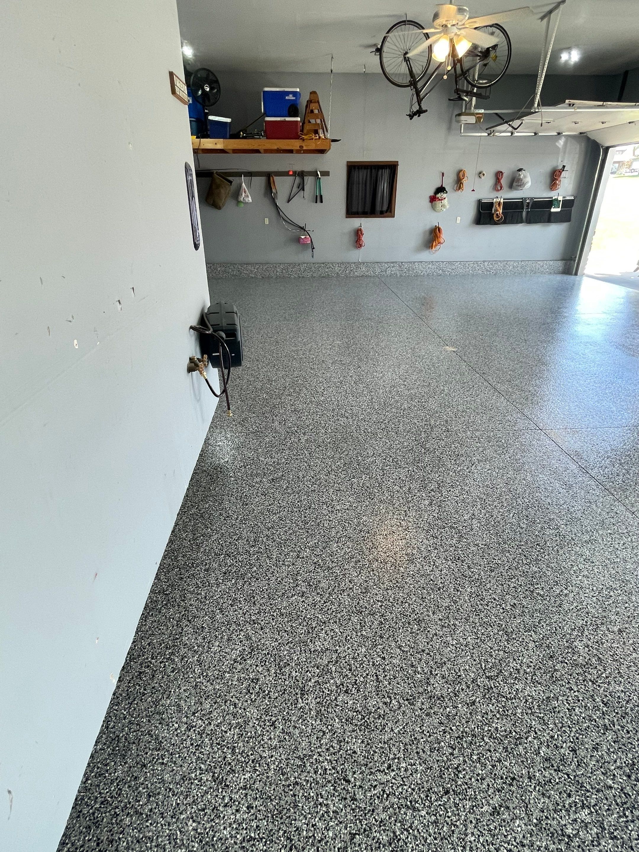Residential Garage Floor Coating in Sioux Falls by Select Painting, Coatings & Garage Cabinets